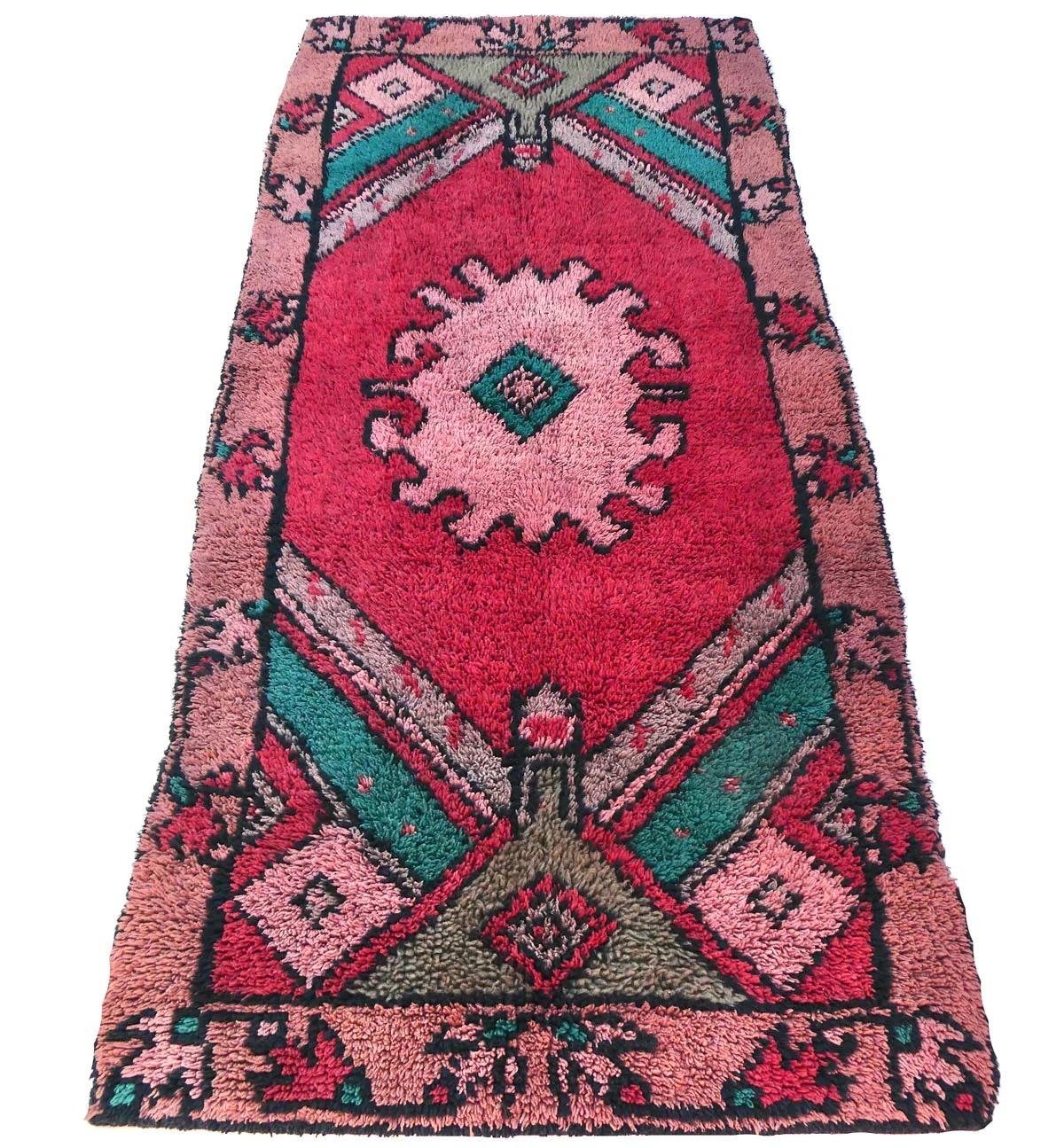 Midcentury handwoven Tulu wool rug handwoven in deep red, pink and turquoise in an abstract pattern.
Dimensions:  2'8 x 6'5