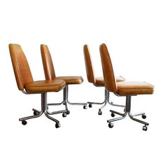 Midcentury and Chrome Rolling Brown Bucket Chairs Set of Four