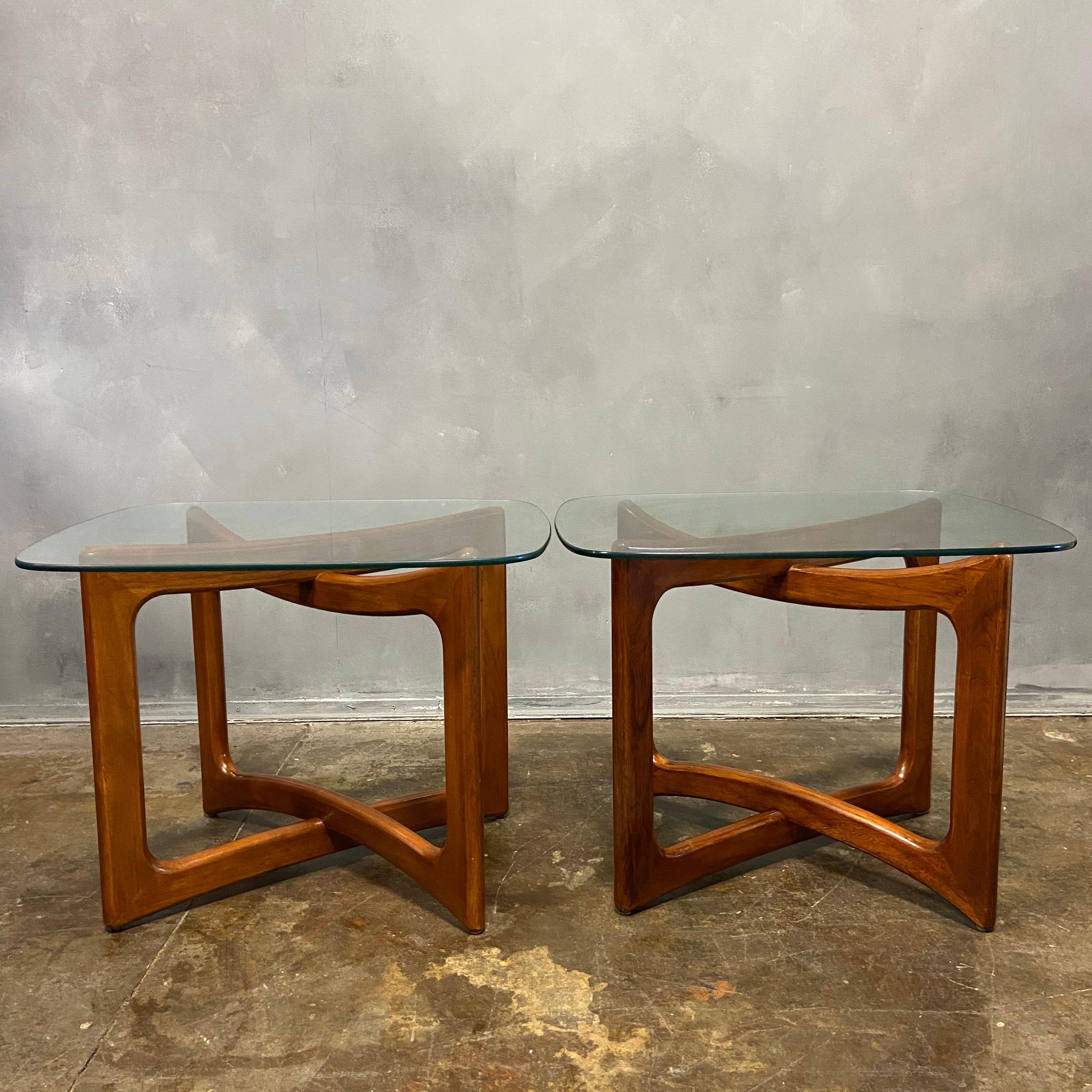 For your consideration are these wonderful side or end tables by Pearsall. The base measures 21 inches wide and 16 1/2 inches deep. The height is 22 inches. The glass top is just less than half inch thick and is 28 x 22”. The glass top shows minimal