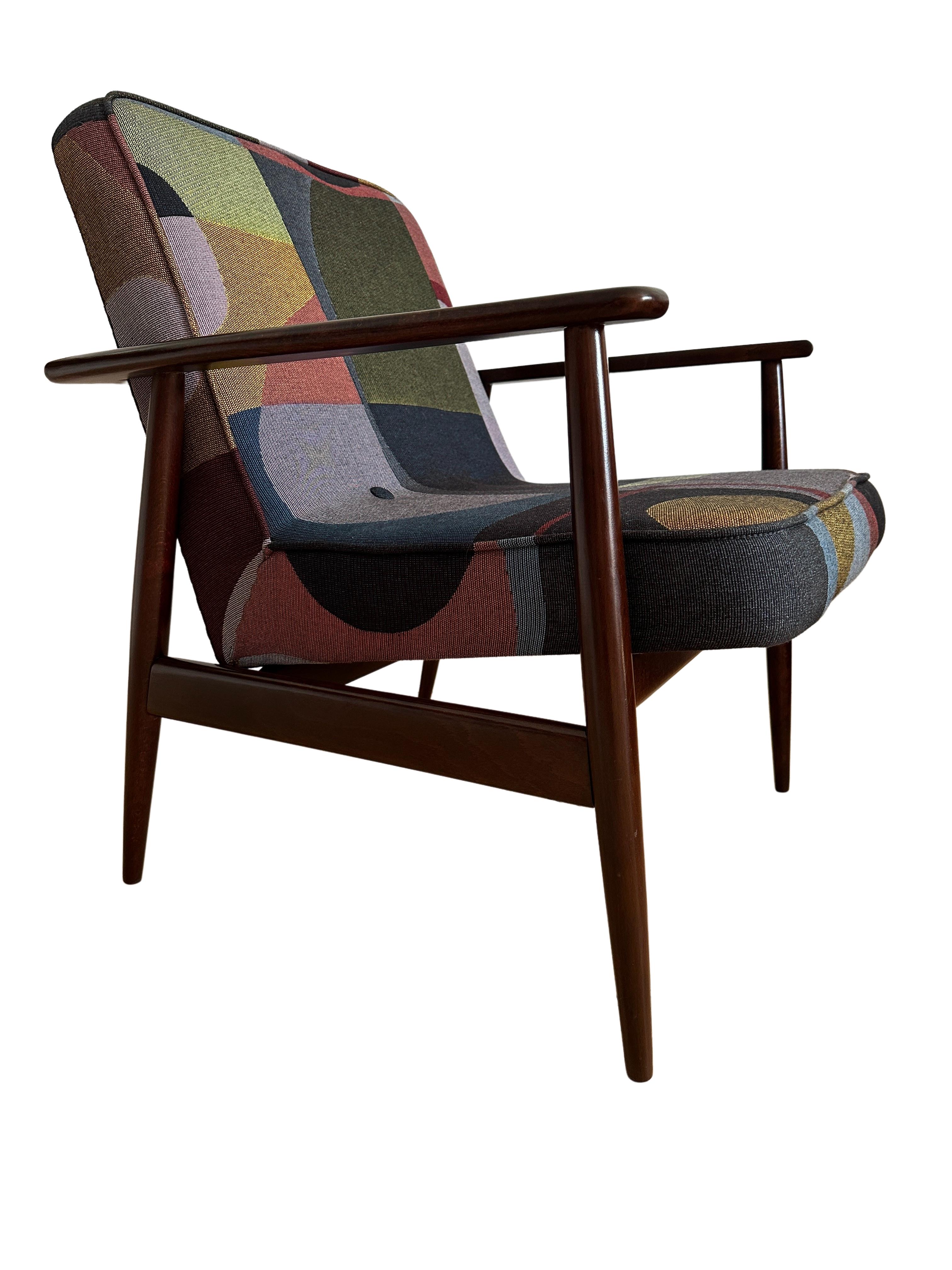 One of the icon of Polish midcentury design, very rare nowadays GFM 300-192 armchair, designed by Juliusz Kedziorek - the author of many innovative, iconic furniture designs. 

The armchair has been manufactured by Goscicinska Furniture Factory in