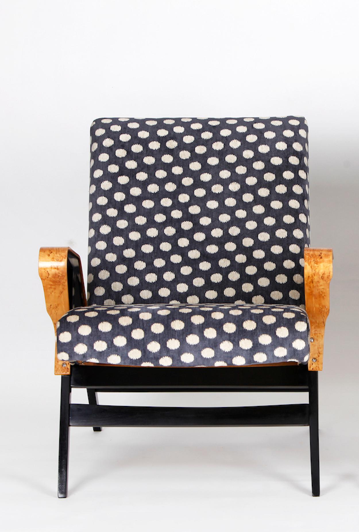 This lounge chair was produced in the 1960s by the Czechoslovak company Tatra Pravenec. It is completely restored, with new upholstery and restored wooden parts. She has a new upholstery in English fabric from Colefax and Fowler.