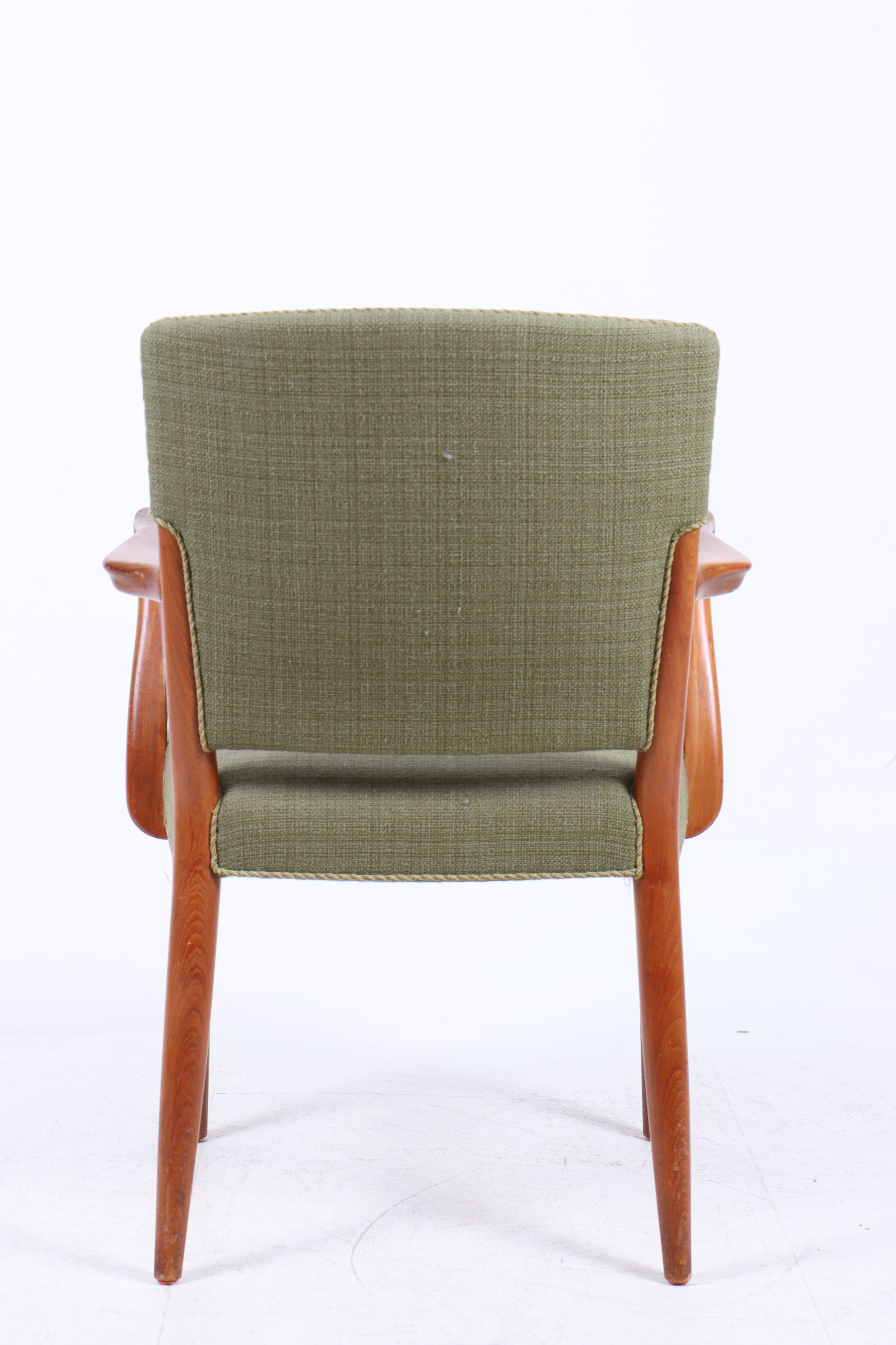 Side chair in teak and fabric, designed by Peter Hvidt & Orla Mølgaard for cabinetmaker Gustav Bertelsen. Great original condition.