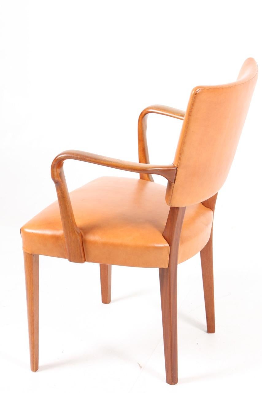 Danish Midcentury Armchair in Walnut and Patinated Leather, Made in Denmark