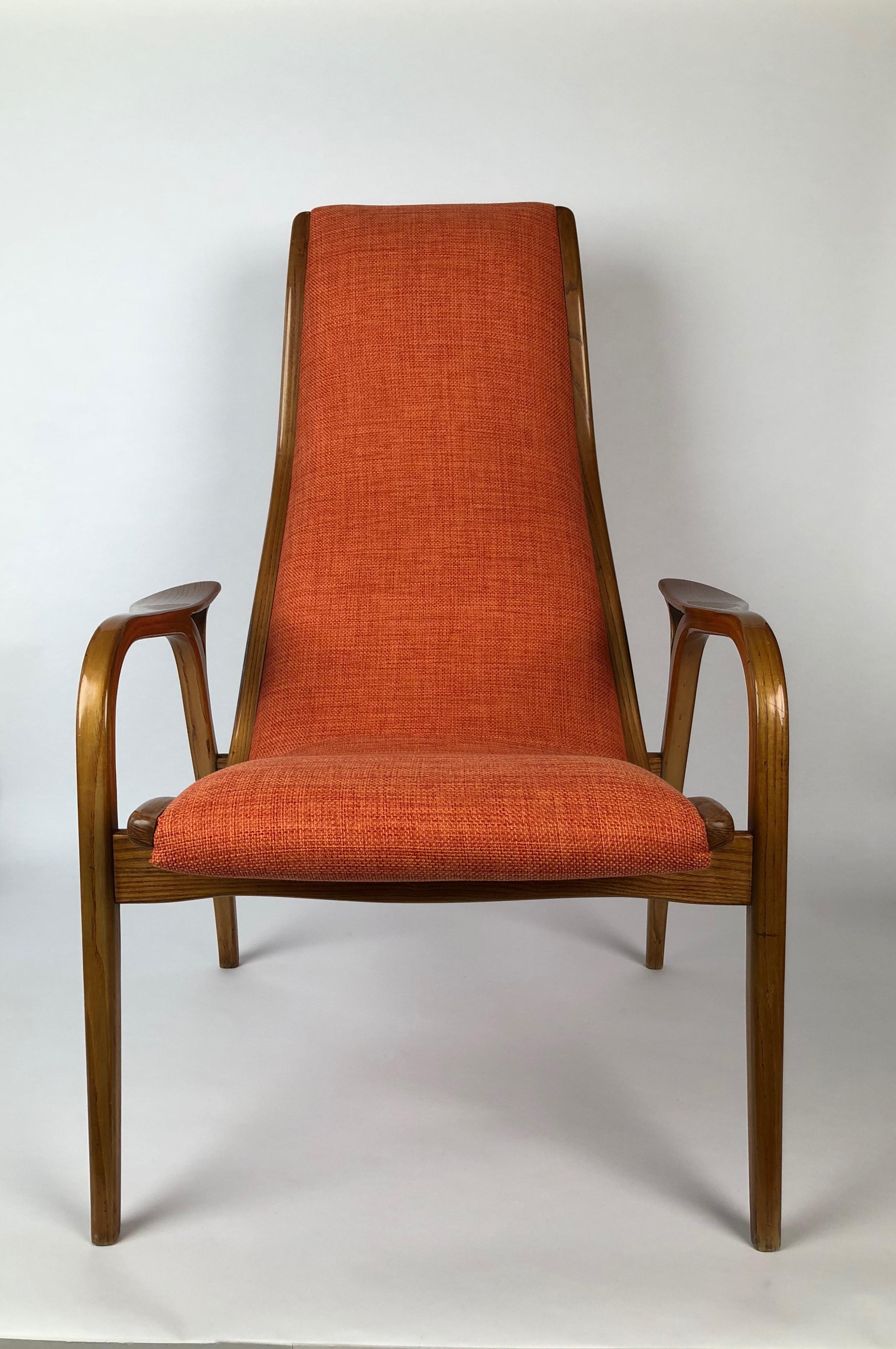 Light weight armchair designed by Yngve Ekström in 1950s, produced by Swedese.
The frame is made in oakwood and has been recovered in orange fabric.
The armchair is un a very good condition.
