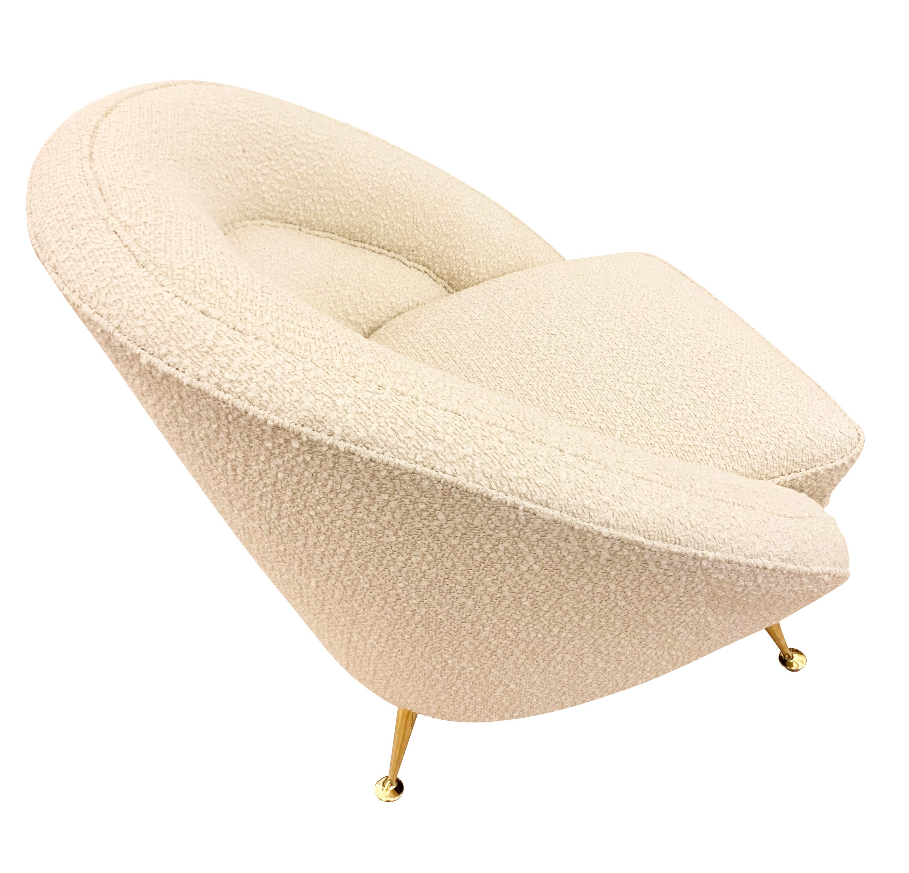 Curvaceous Mid-Century lounge chairs by ISA Bergamo with brass feet. Recovered in an off-white boucle fabric. Price for the pair-sold individually on request.

Condition: Minor wear consistent with age and use. Recently recovered.

Width: 32”

Seat
