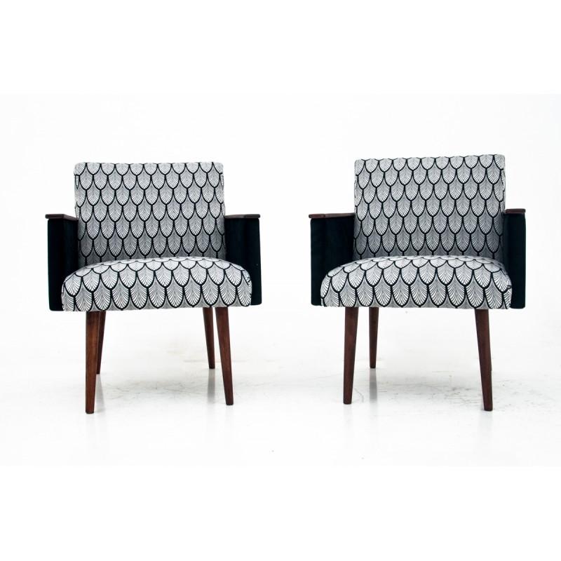 Set of two vintage armchairs after renovation of the Mid-Century Modern period. This is after complex renovation of wood. The upholstery changed for the new one with feather-like pattern.