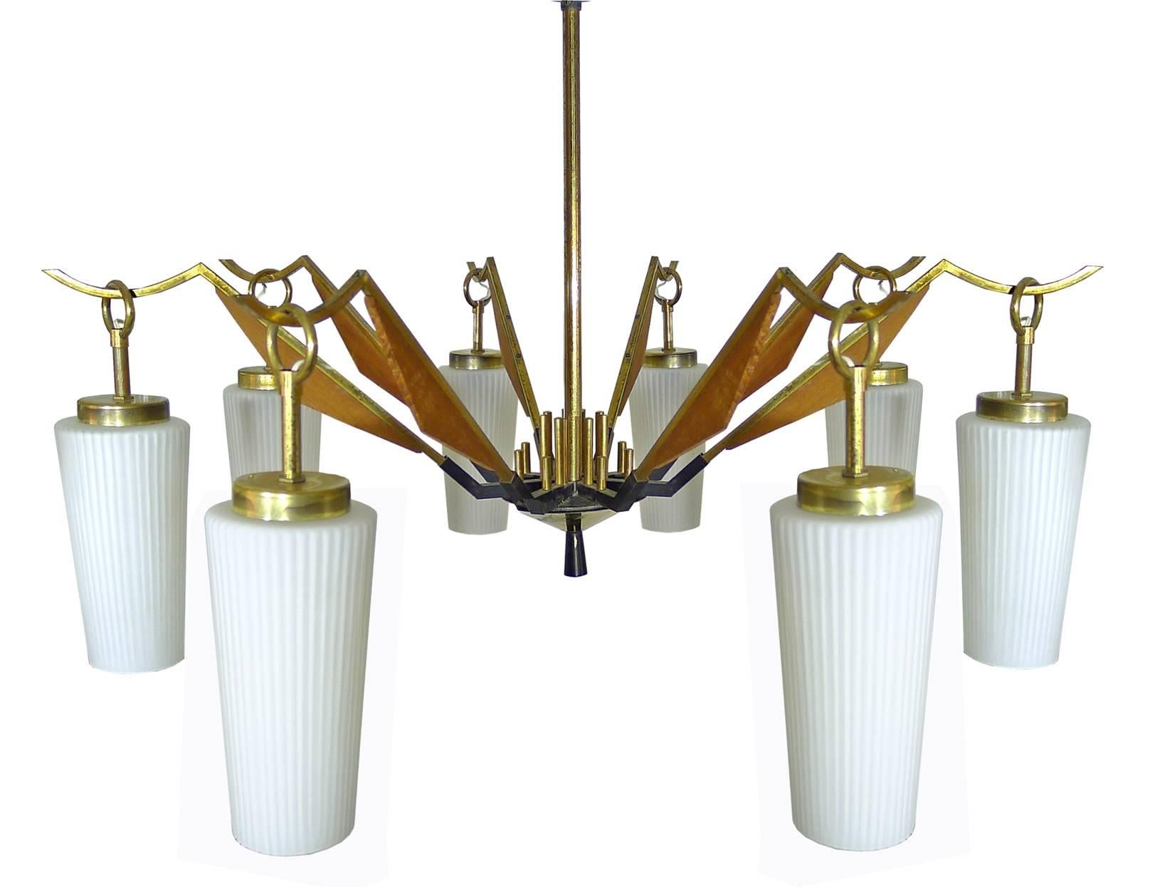 Large Vintage Mid Century Modern Arredoluce or Stilnovo Brass and Teak Wood Spider Chandelier with Eight Hanging Arms Glass Shades in the Danish Style  . Age Patina.
Measures:
Diameter:30 in/ 76 cm
Height: 40 in / 100 cm
Weight 11 lb. (5