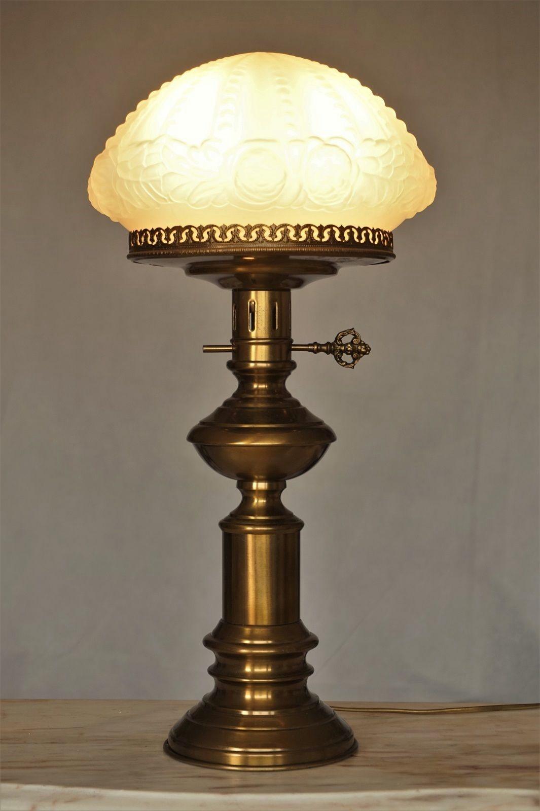 Art Deco brass two-light table lamp with beautiful frosted glass shade, France late 1930s, in very good condition.
Measures:
Height 23 inches (58 cm)
Diameter 11.75 inches (27 cm)
Two E14 light bulb sockets.
 