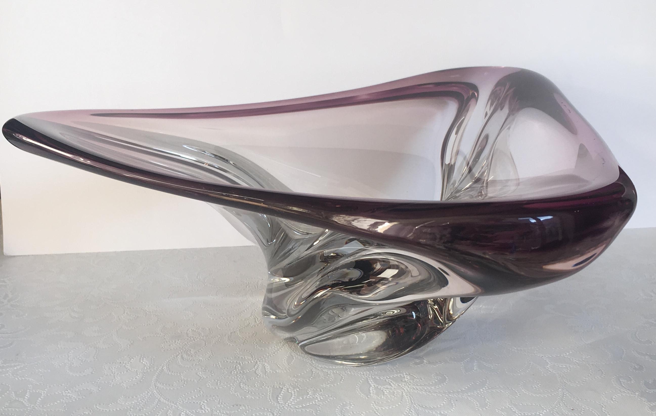 Midcentury art glass bowl from the 1950s-1960s attributed to Val Saint Lambert. 

Beautiful organic form.
Solid, heavy piece.
Unmarked, previous owner state she had removed the paper marking Val Saint Lambert.

Weighs 9 kilos.
 