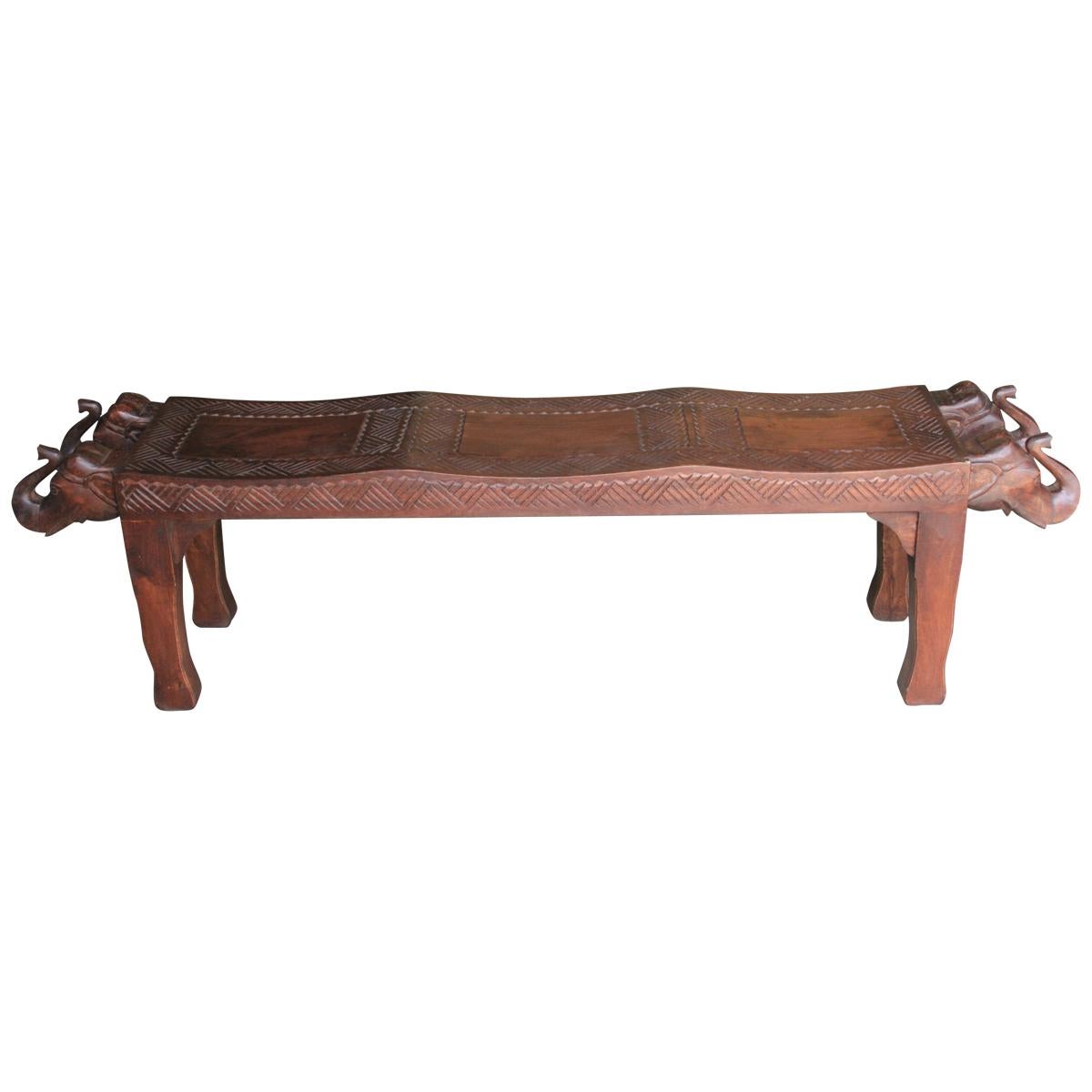 Midcentury Artistically Carved Thick Seat with Elephant Heads on Either Side For Sale