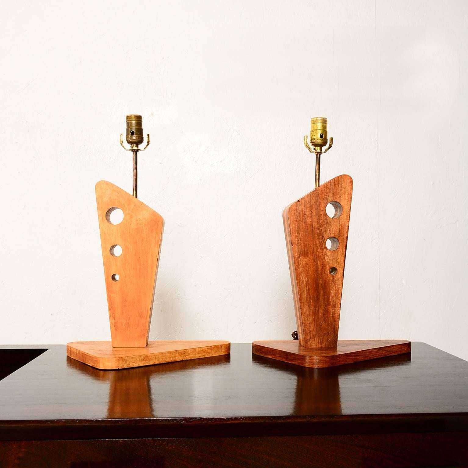 Midcentury atomic wooden table lamps by Georg Gin. 
U.S.A, 1950s.
Marked 