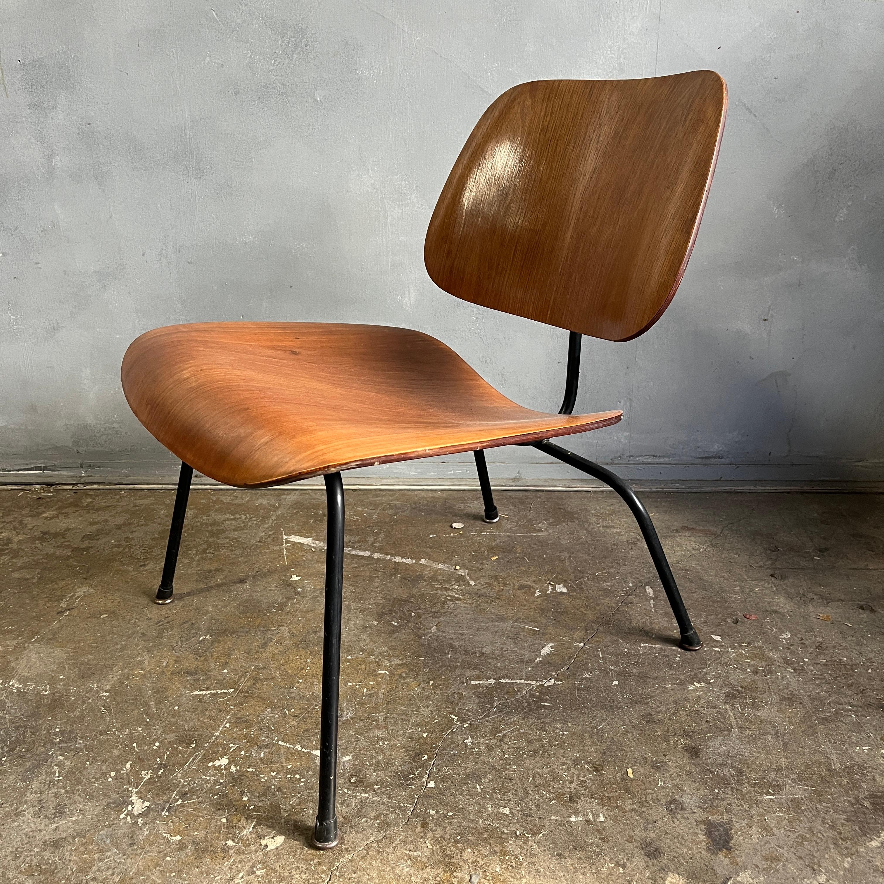 The LCM ( Lounge Chair Metal ) by Herman Miller is our favorite of the Eames plywood chair designs. The metal frame gives an overall visual lightness and makes the wood seat and back appear to float. It combines industrial materials in an original