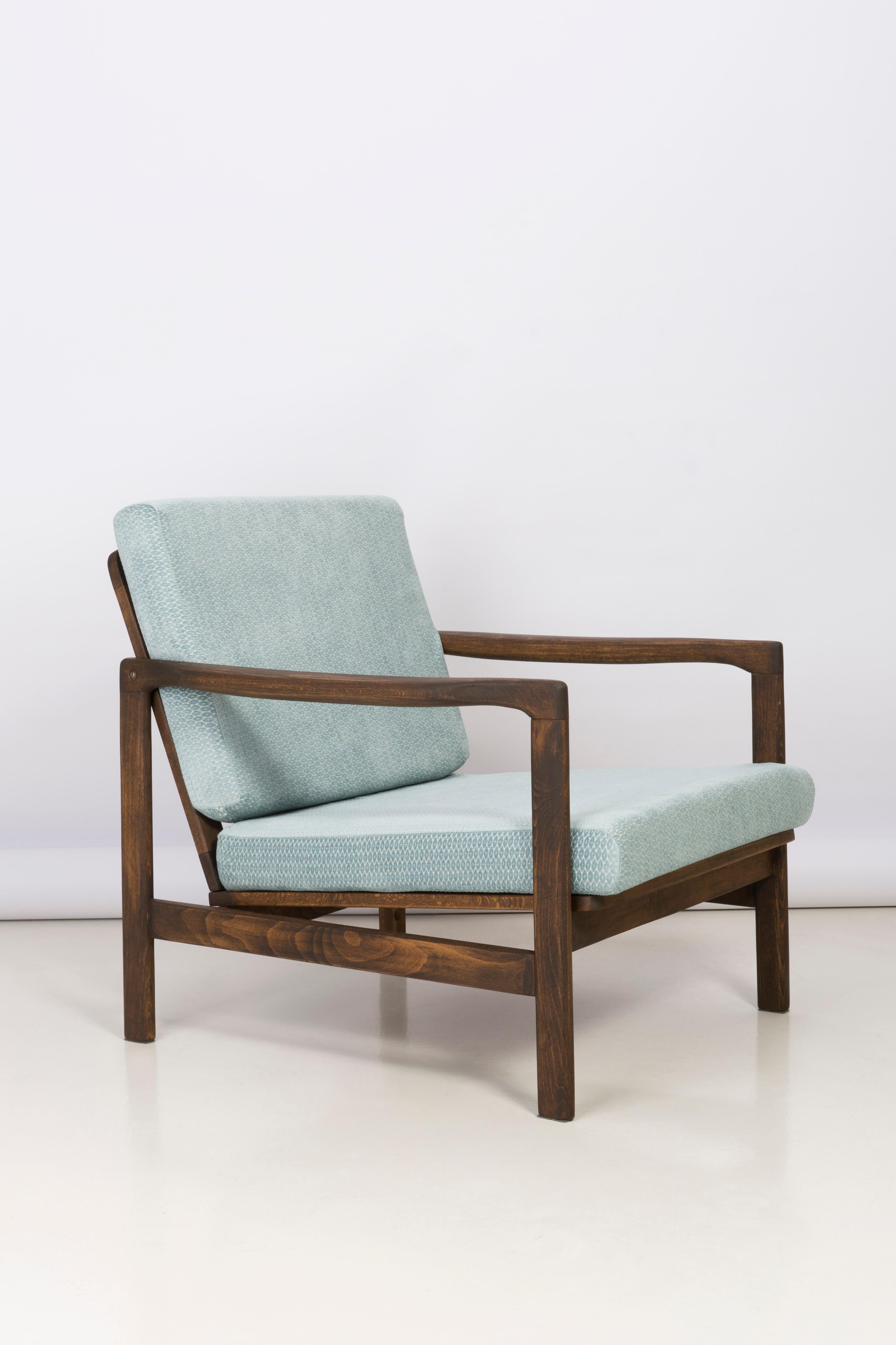 The B-7522 armchair was designed in the 1960s by Zenon Baczyk, it was produced by Swarzedz furniture factories in Poland. Furniture kept in perfect condition, after full upholstery and wood renovation. Stabile and very comfortable armchair, dressed