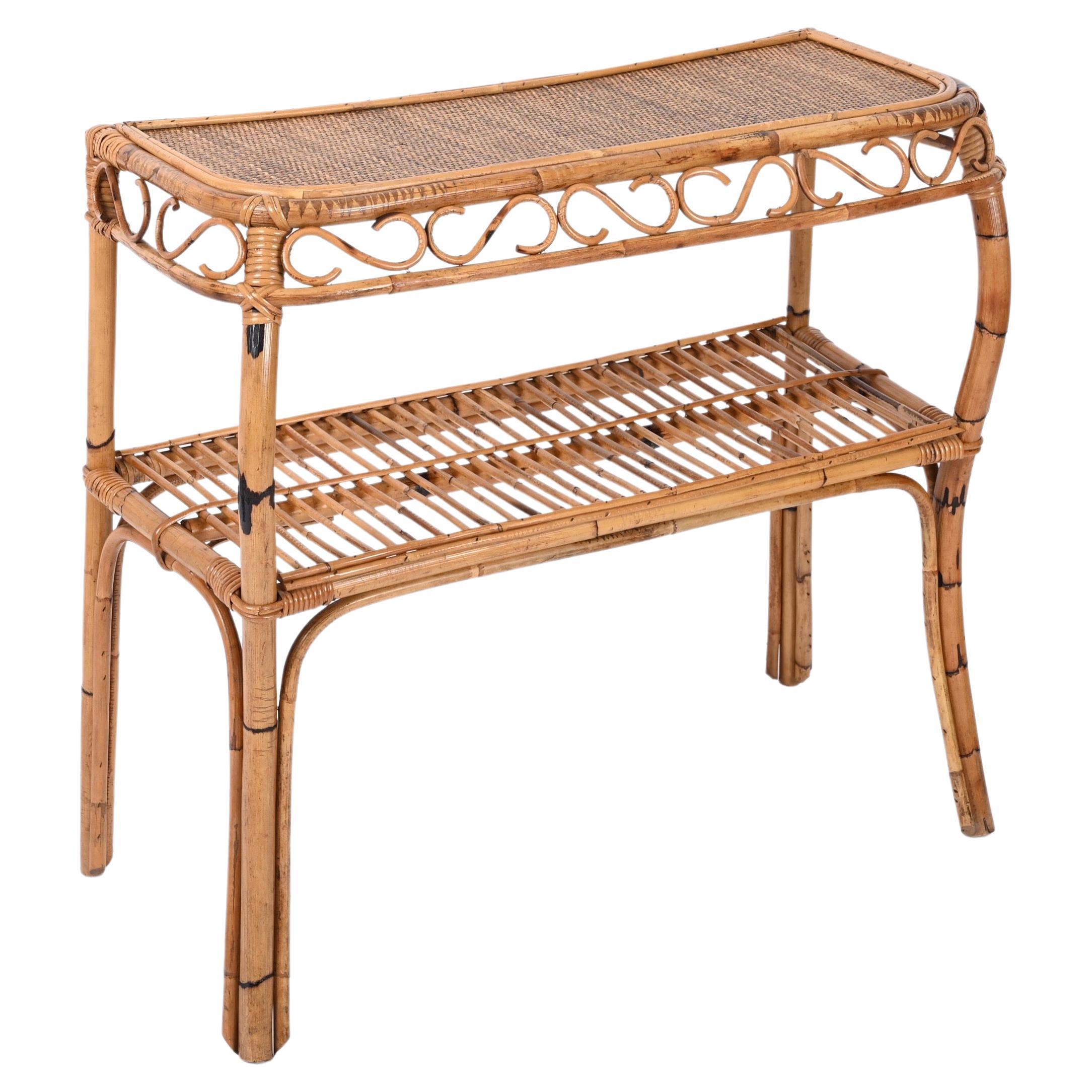 Gorgeous console table in bamboo and rattan. This amazing piece was designed in Italy during the 1960s and is attributed to Franco Albini. 

Fully handmade, perfect example of Italian manufacture from the 60s. 
The console has four beautiful