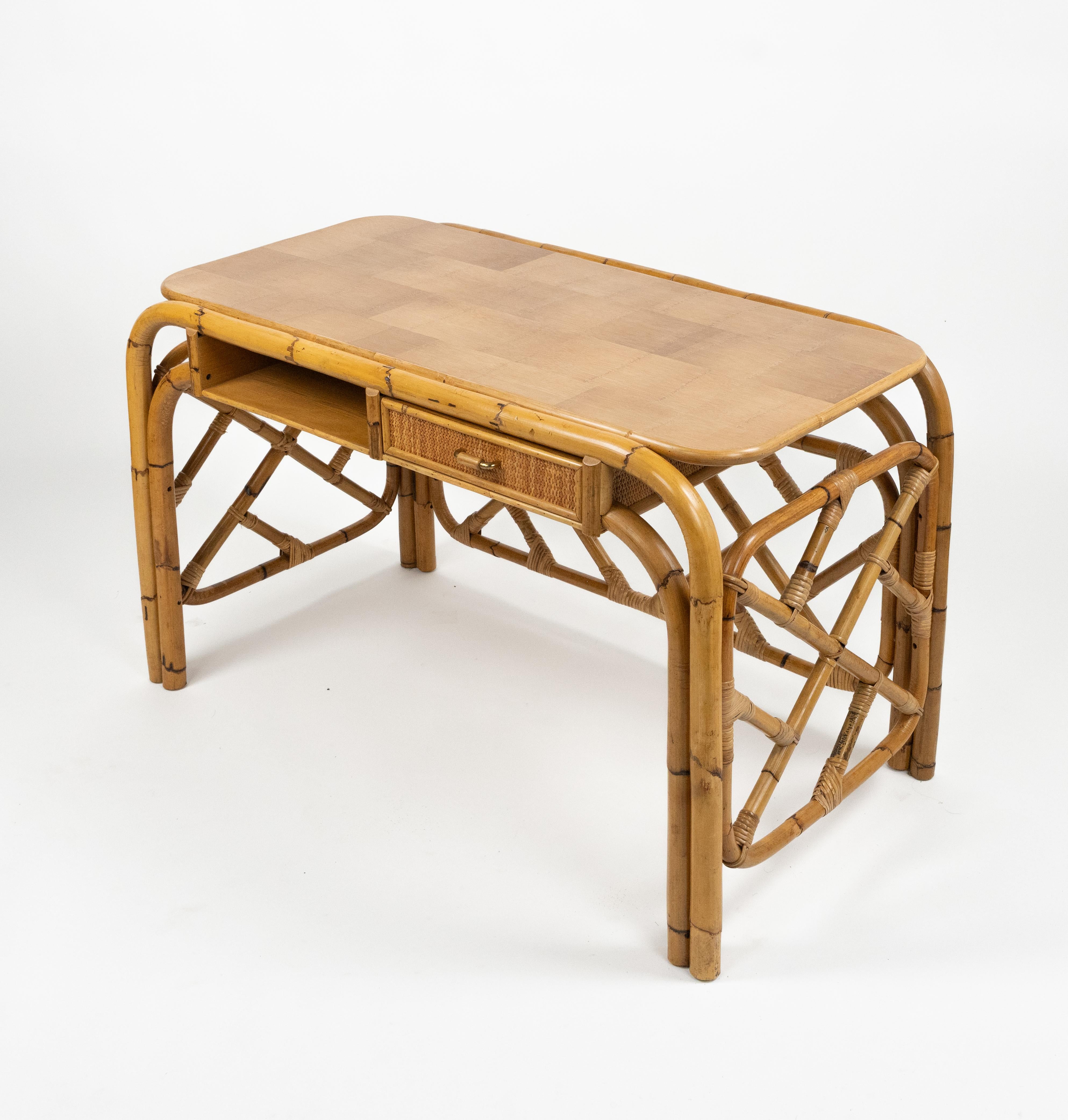 Midcentury amazing desk writing table in bamboo, rattan and wood with one drawer in the style of Vivai Del Sud.

Made in Italy in the 1970s.

Vivai del sud, Gabriella Crespi and Arpex were the three leading design studios in 1970s Italy specialized