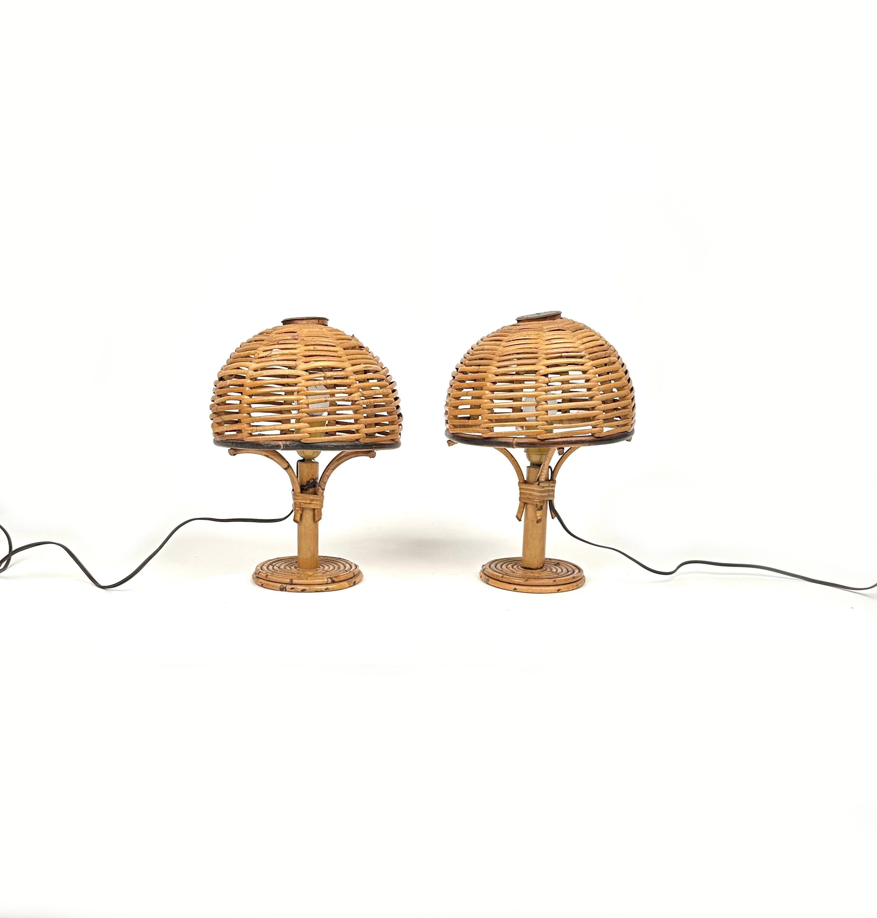 Beautifuls pair of table lamps in bamboo and rattan in the style of Louis Sognot.

Made in Italy in the 1960s.

Louis Sognot was a French designer best known for his elegant furniture made from a combination of rattan and wood. Sognot was