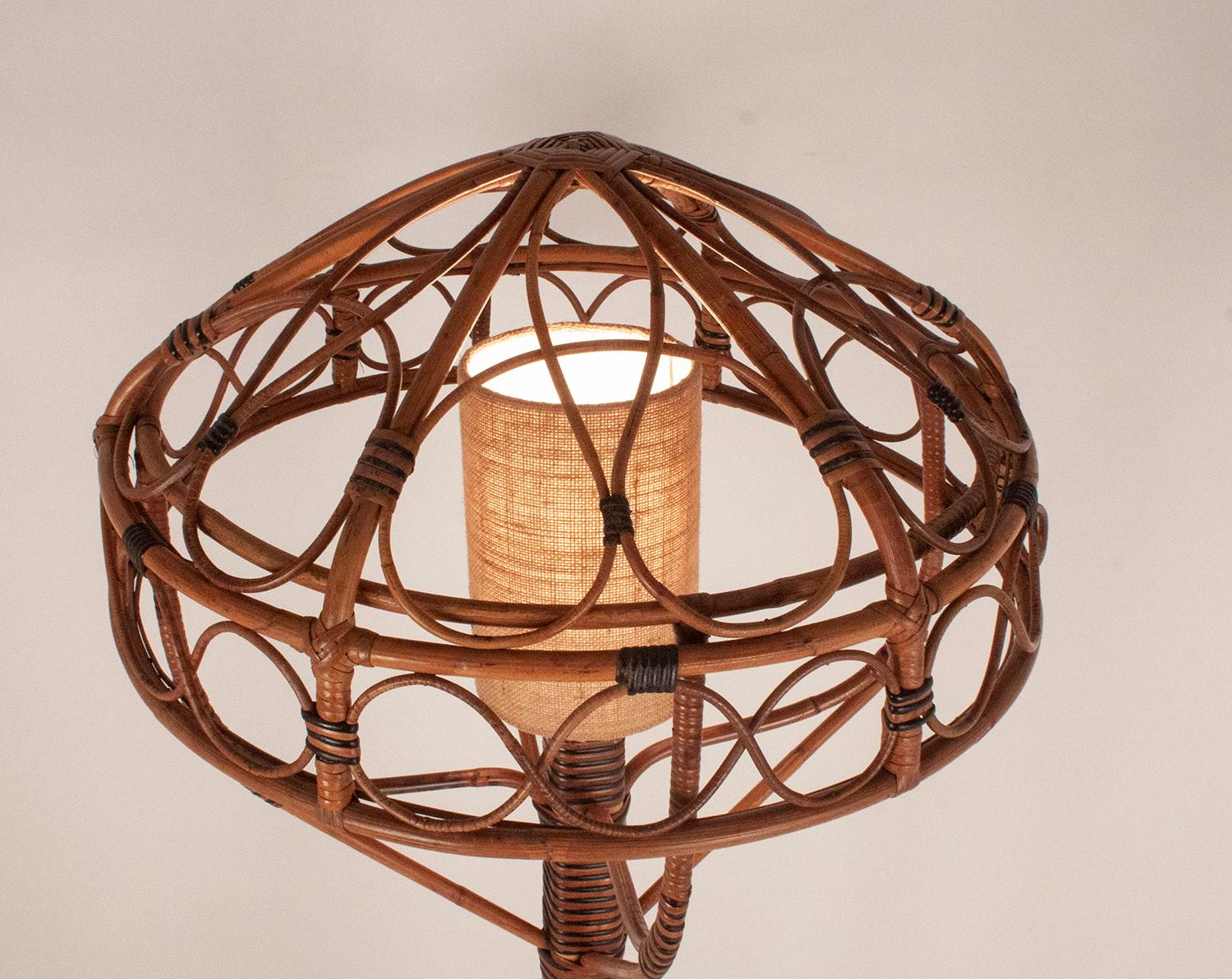 Bamboo lamp, European wiring.
New fabric lampshade in tan color.
I was in a house on the Costa Brava.

