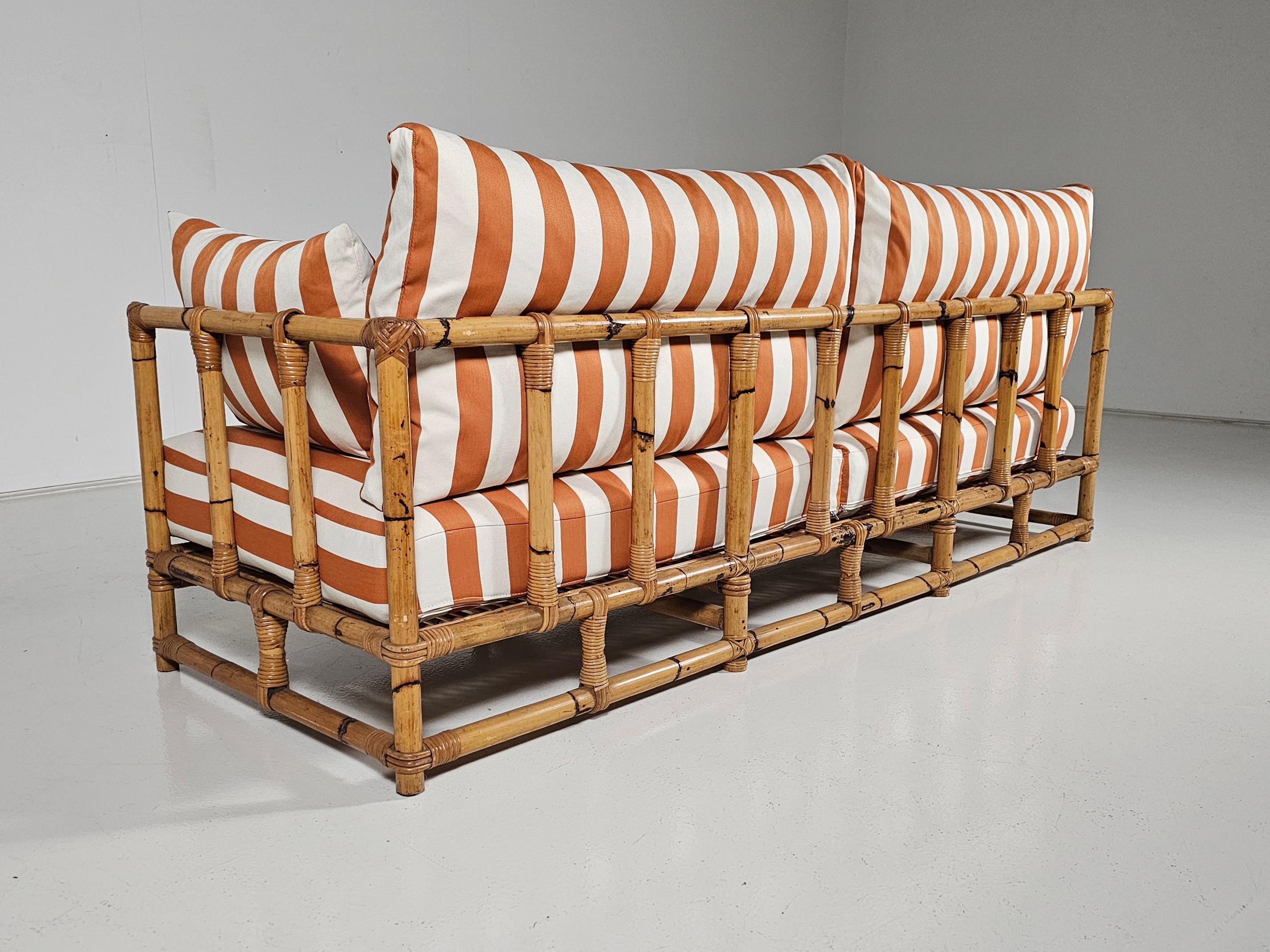 Midcentury Bamboo indoor/outdoor sofa with orange/cream fabric, France, 1960s 2