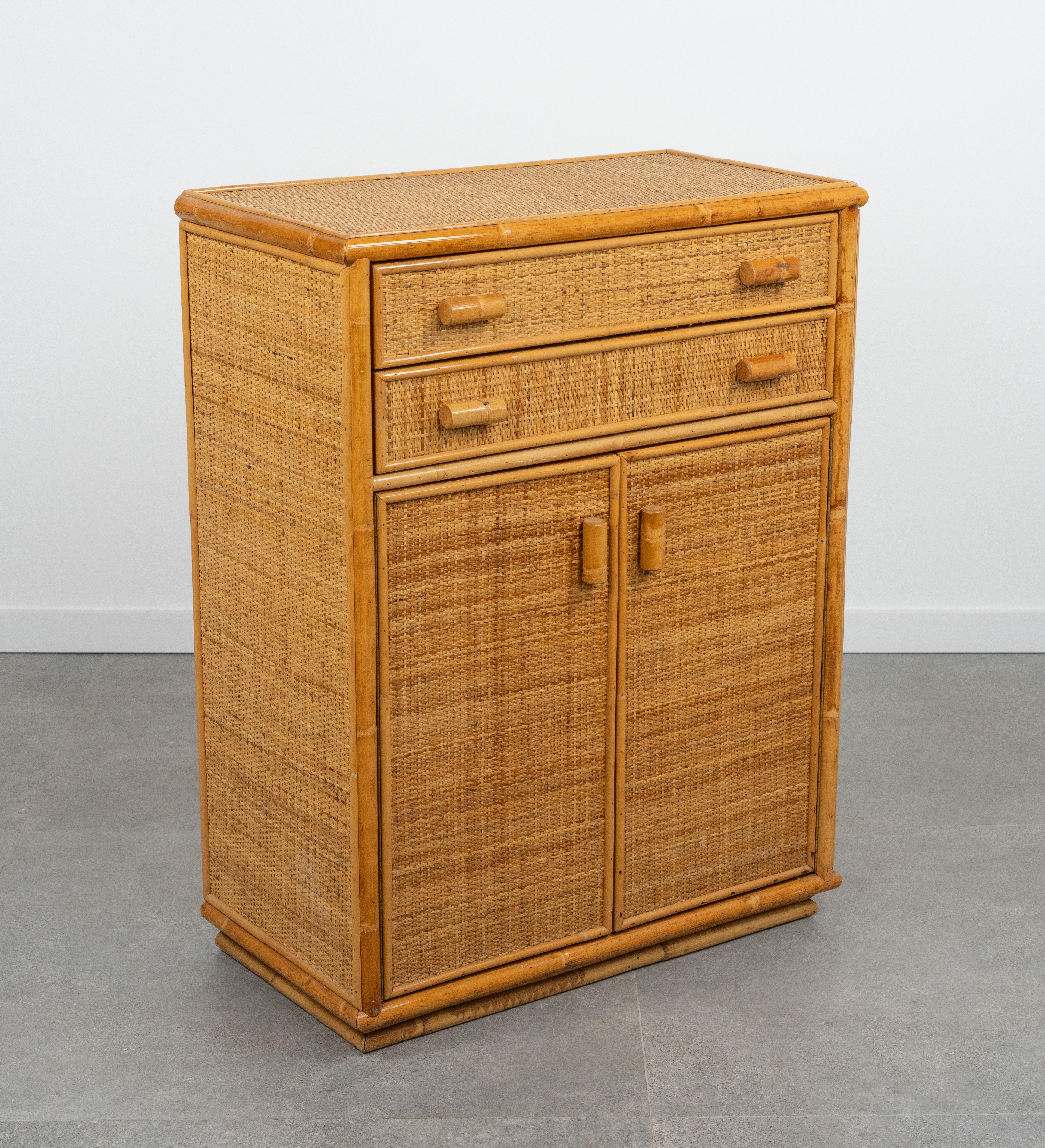 Midcentury beautiful chest of drawers in bamboo, rattan and wicker.  

Made in Italy in the 1970s.  