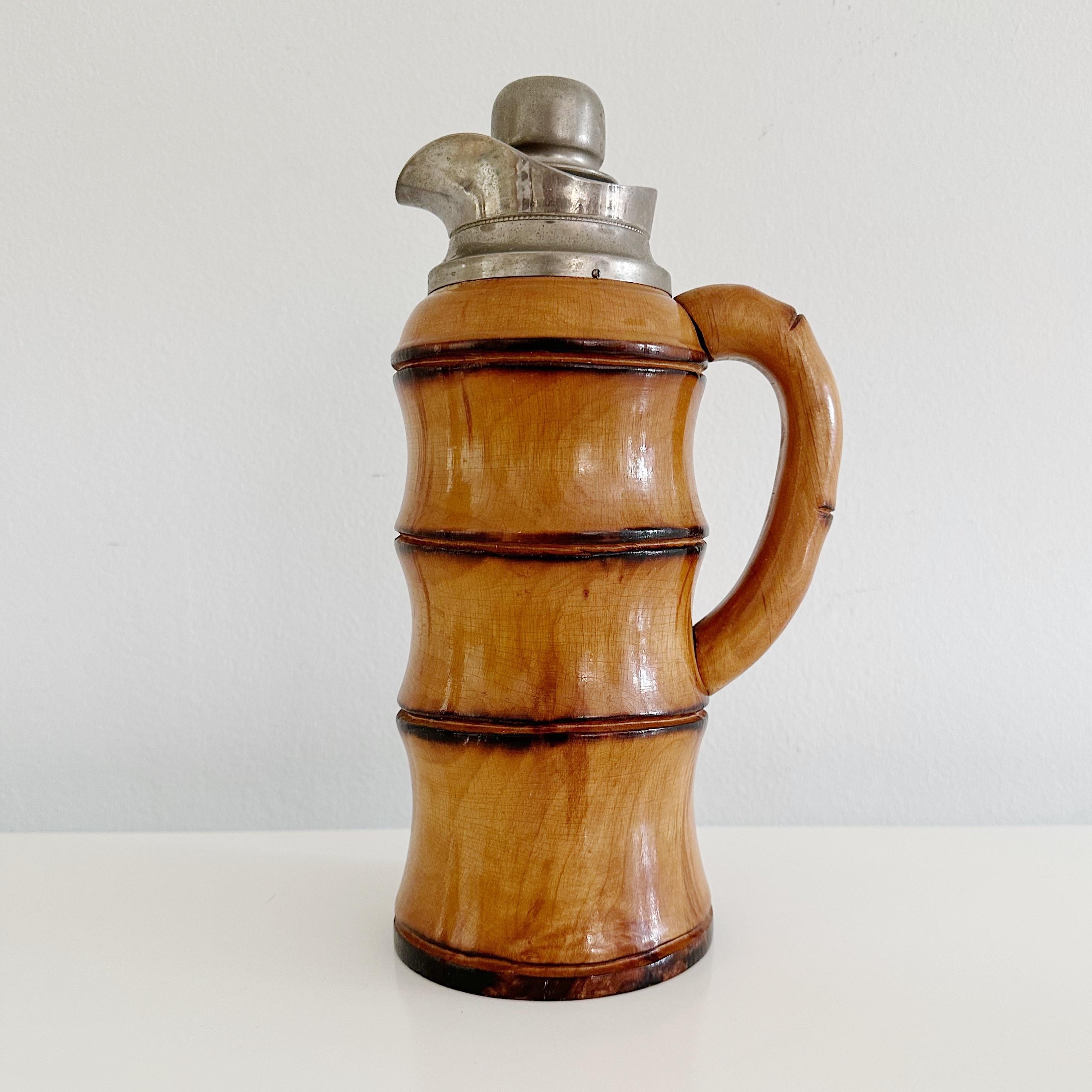 Midcentury thermos decanter in bamboo and metal by Aldo Tura For Macabo Cusano Milanino, 1950's. Made from asian bamboo with the inside glass part having a double cavity, and a cork and metal stopper.   Signed on the underside.