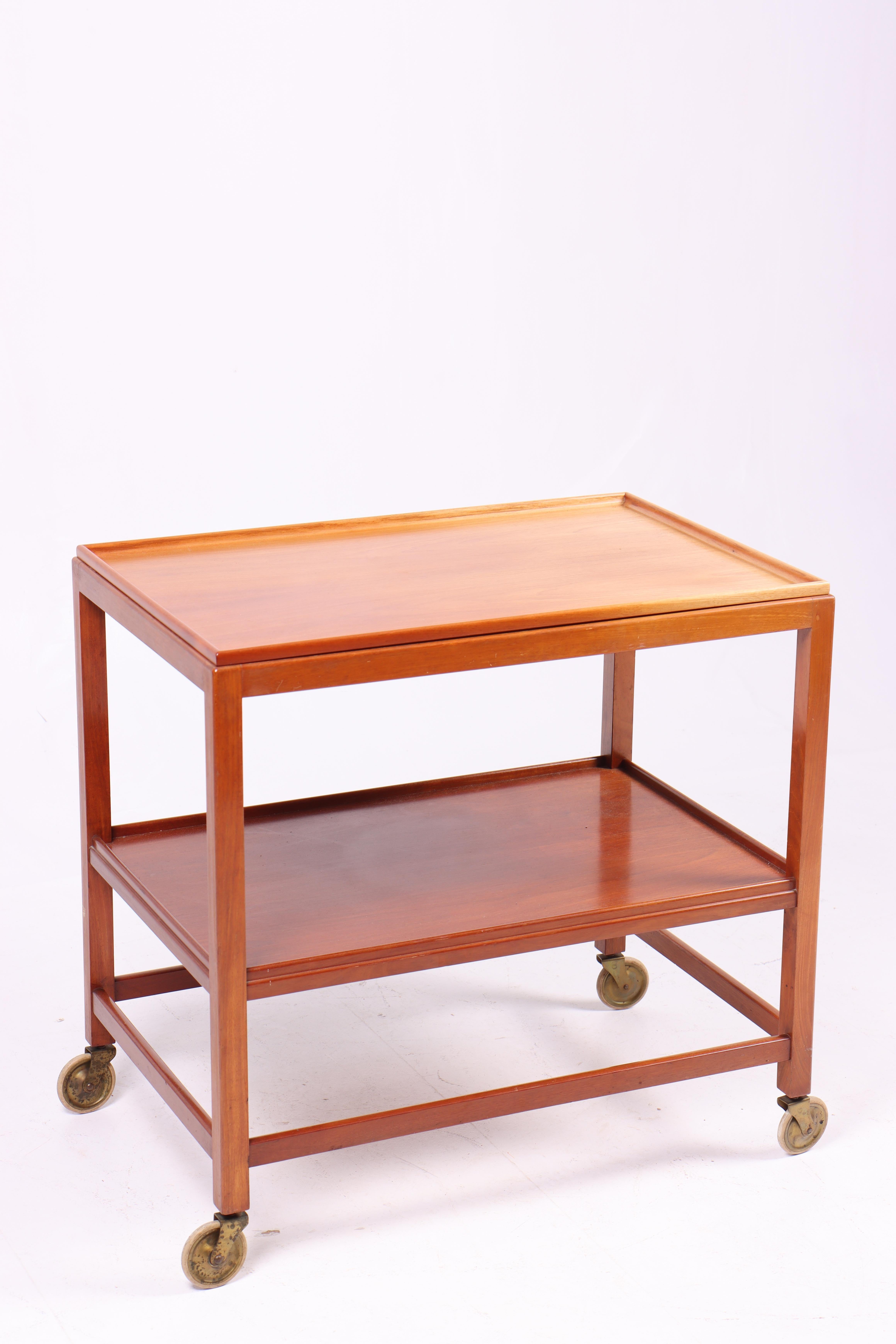 Trolley with removable top in mahogany, designed and made by Rud Rasmussen. Great original condition.