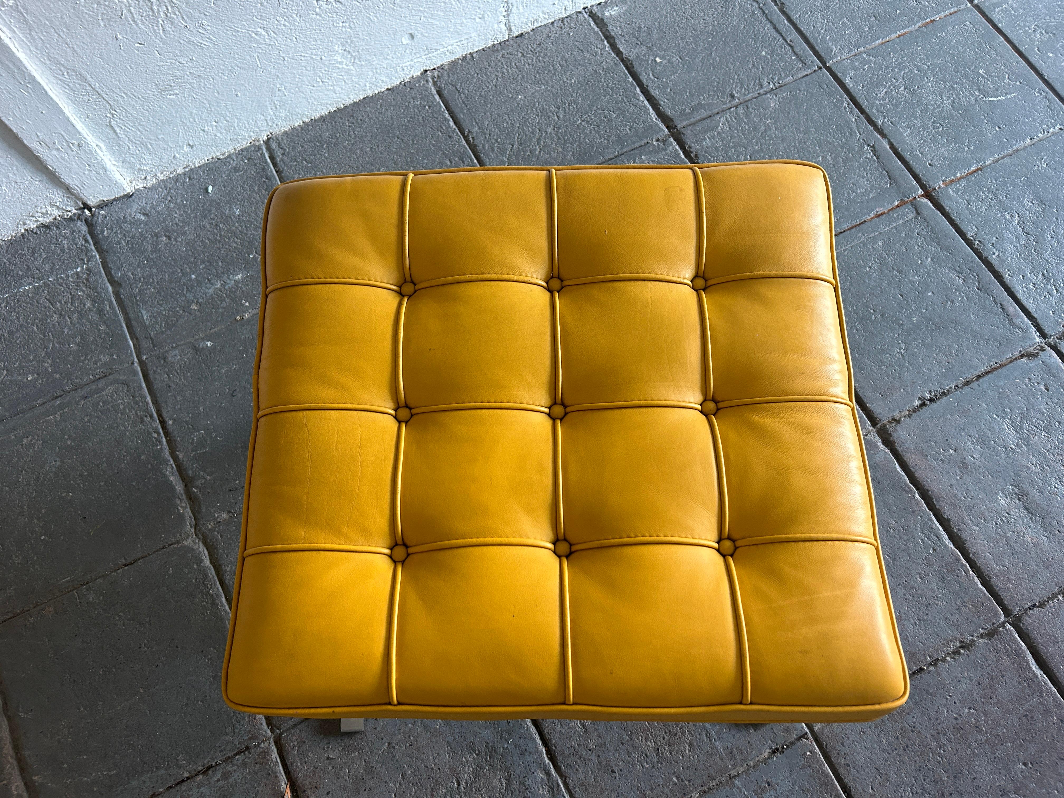 Mid century Ludwig Mies van der Rohe Barcelona ottoman or stool for Knoll studio. The classic design that helped define Mid-Century Modernism. Premium leather in a Rare bright yellow color. As you can see they are in very good condition near