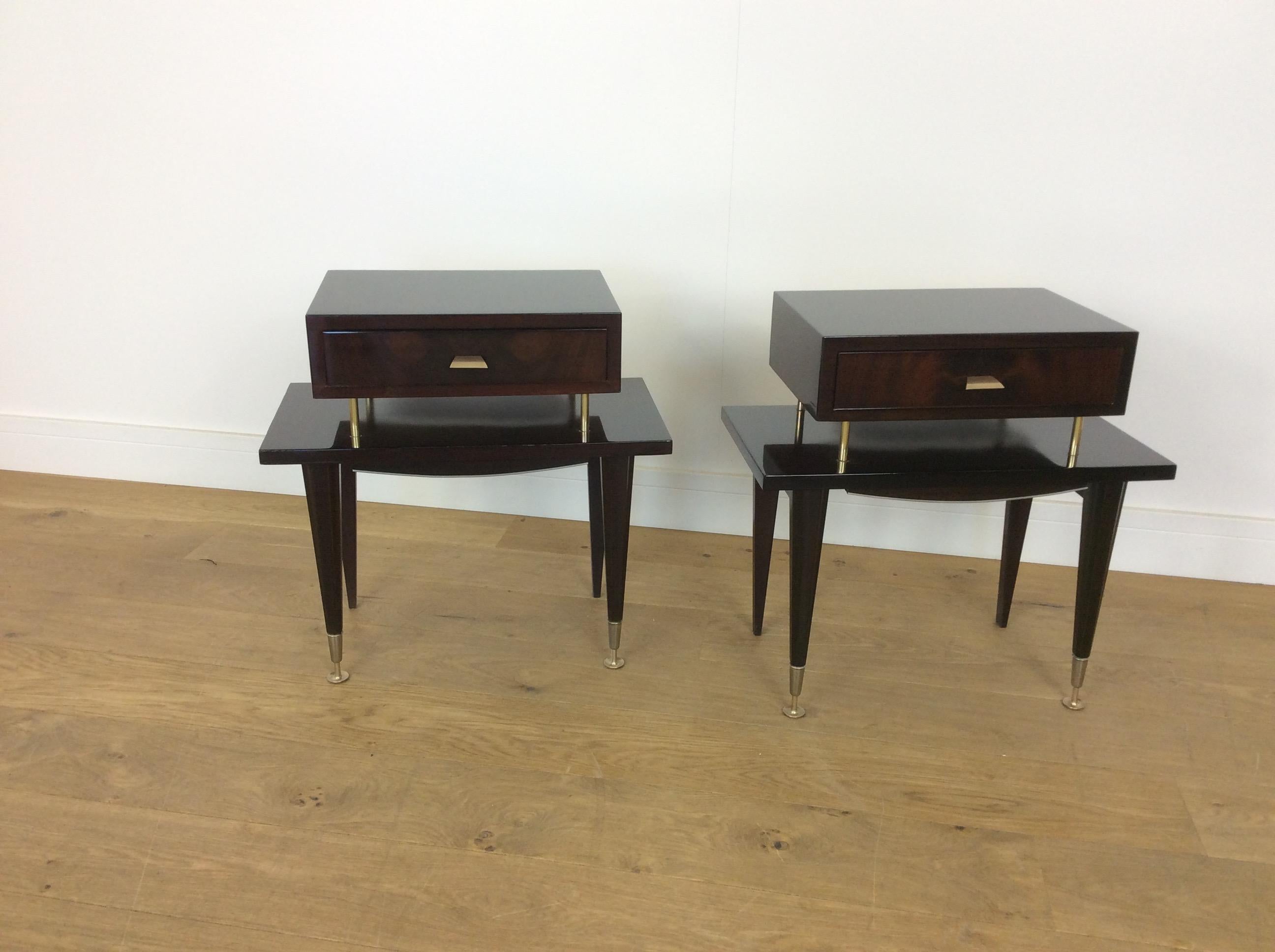 Midcentury nightstands.
A pair of midcentury bedside cabinets.
Very stylish bedside tables in a dark mahogany by Ameublement NF Meuble.
Measures: 56 cm H, 55 cm W, 30 cm D.
French, circa 1960.