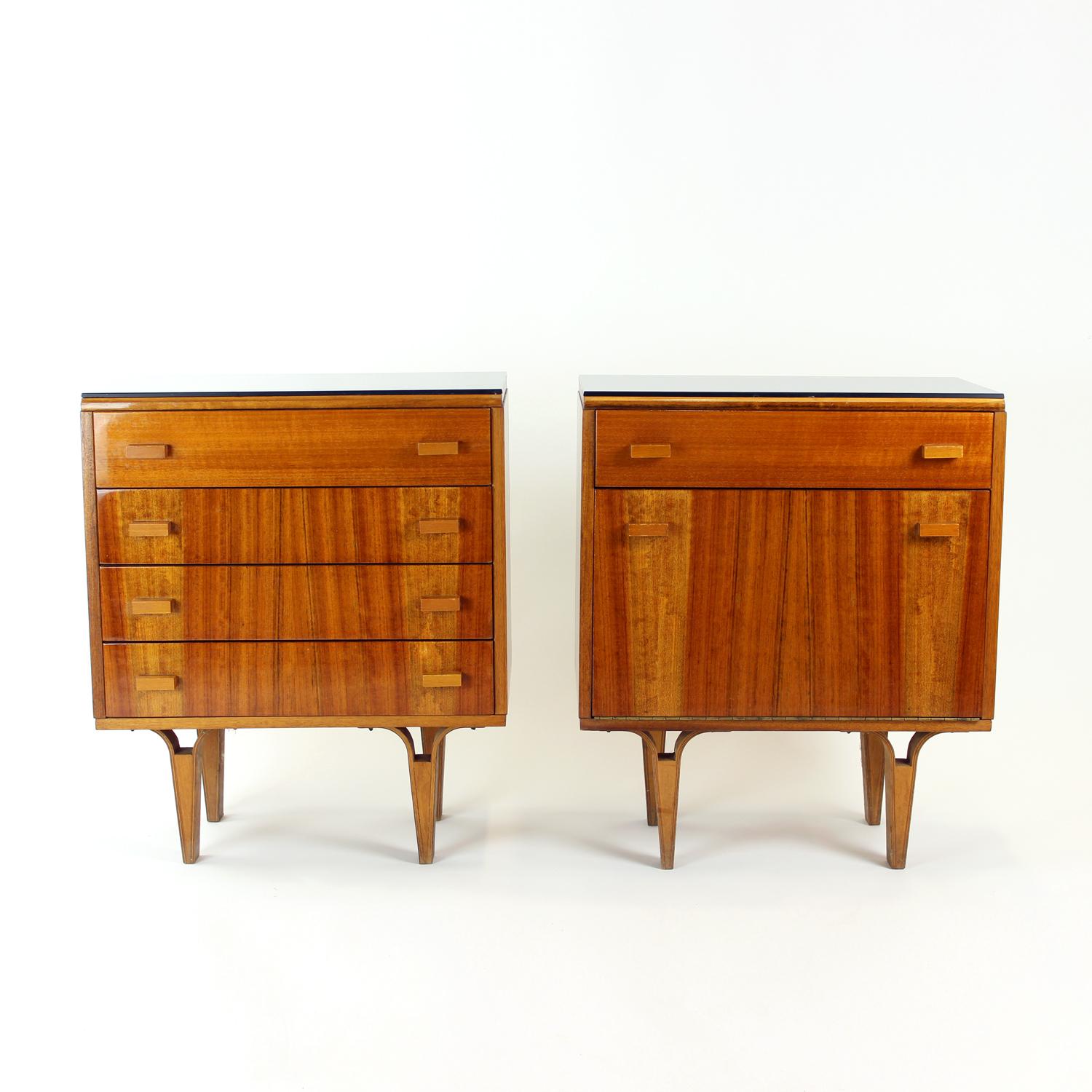 Set of two beautiful mid-century bedside tables. Produced by Novy Domov company in 1960s. The original label still attached on the back. The tables are made of beautiful walnut veneer on oak wood. The veneer looks particulary striking. The top board