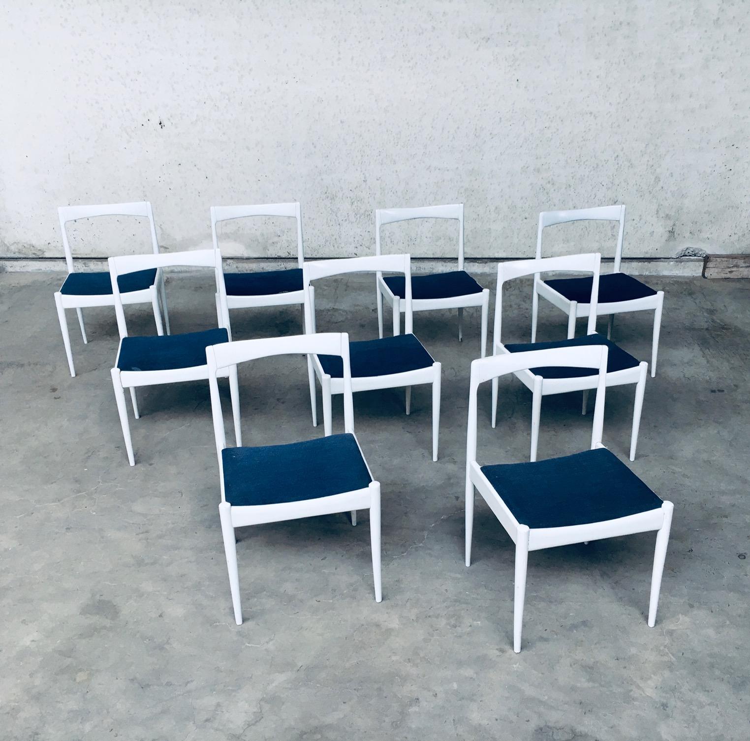 Vintage Mid-Century Modern Belgian design set of 9 white dining chairs, Belgium 1970's. White laquered birch wooden frame with original blue denim looking fabric seats. In the style of scandinavian midcentury modern design chairs. The white lacquer