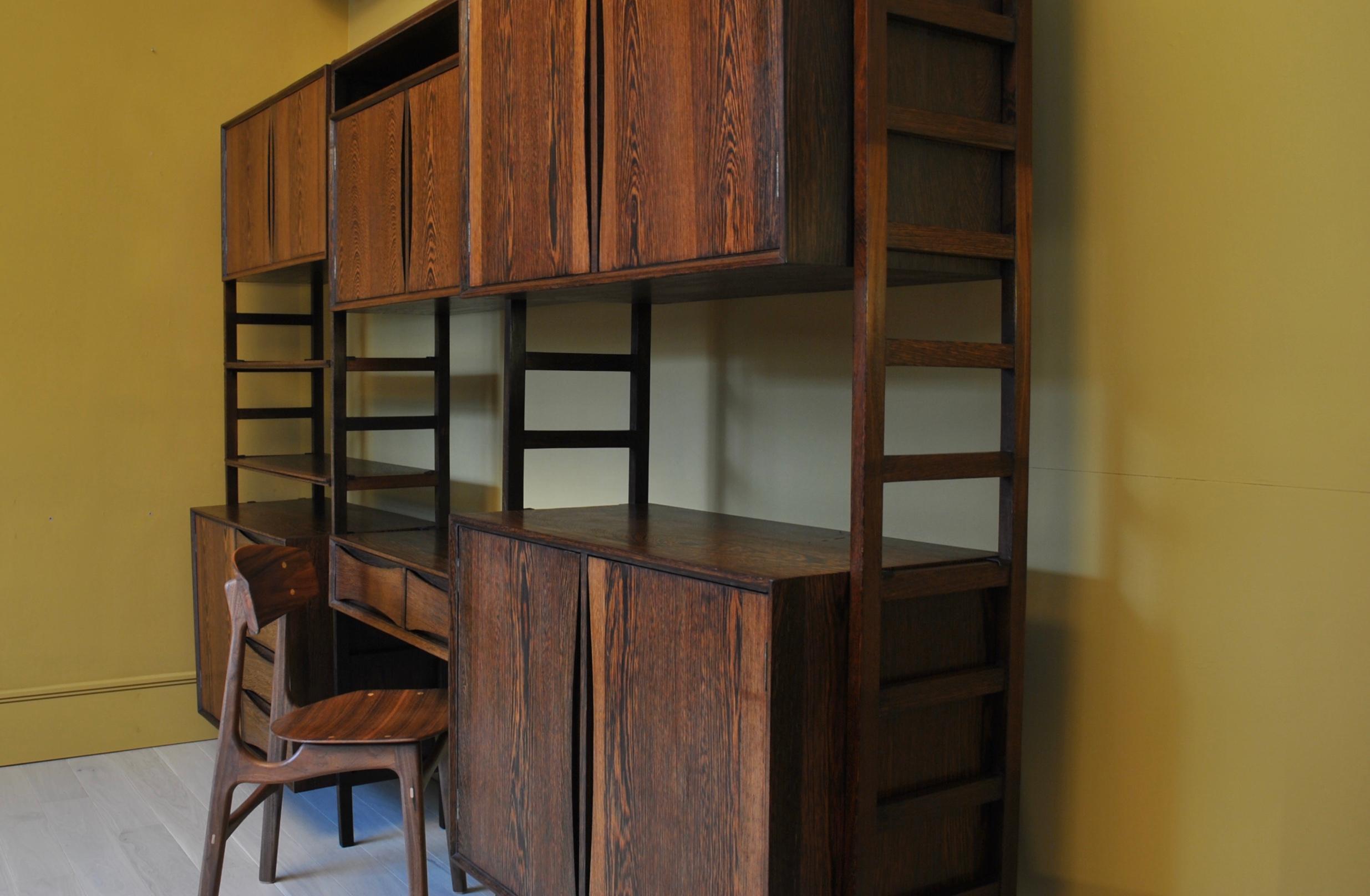 An extremely unusual and totally customizable modular wall unit system from Belgium, circa 1960. Very rare to see such furniture made from Wengé. It has the most glorious grain and there really isn’t much of a comparison to other timbers. A