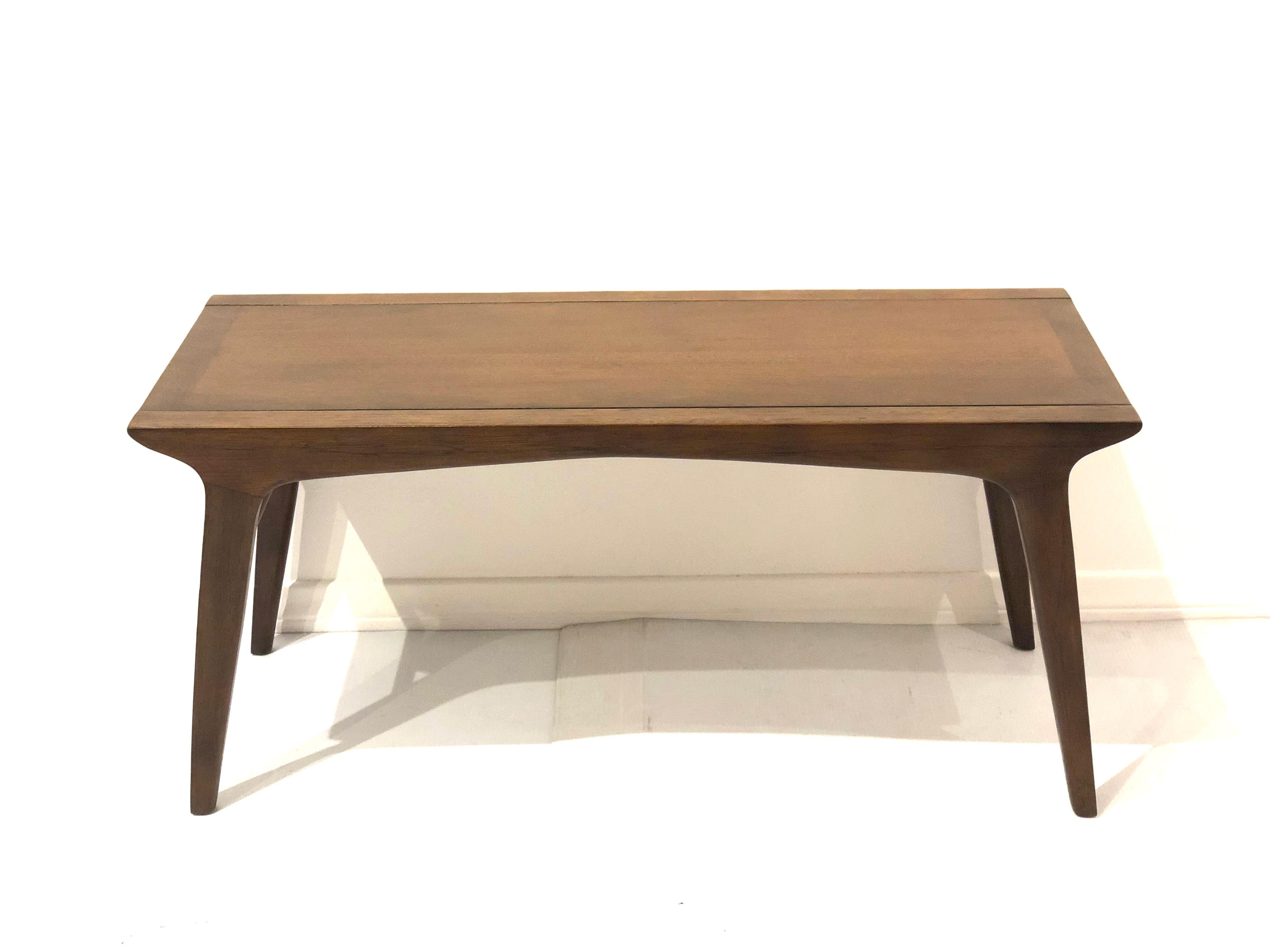 Modernist bench or table by John Van Koert for Drexel, superior quality and construction. Scaled down version of the Classic dining table, simple, elegant design. solid and sturdy freshly refinished in a walnut stain.