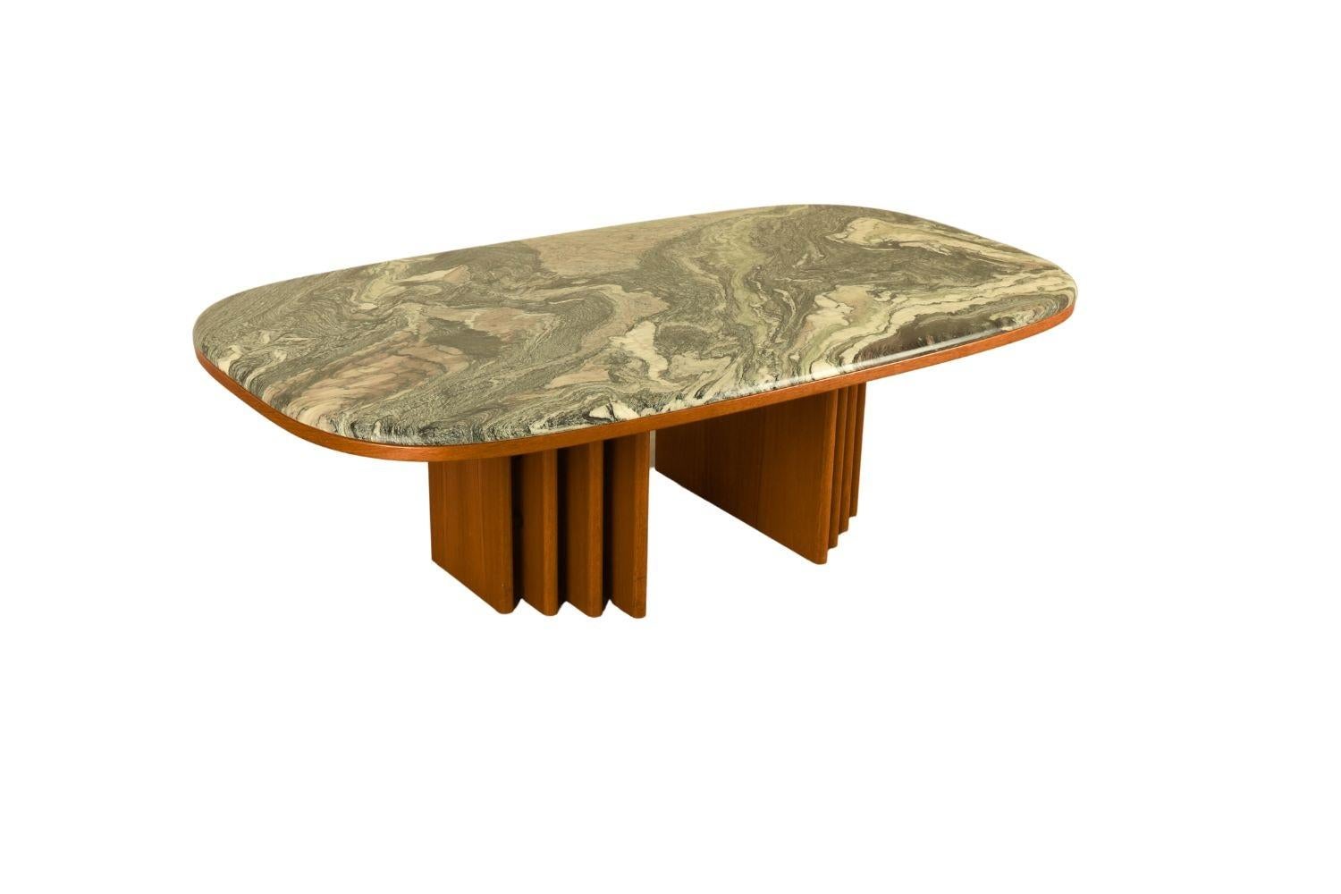 Stunning swirl marble top coffee Table, by Bendixen made in Sweden. The top slab has rounded edges, is heavy and thick. Imported and extracted from Italy quarries. Incredible swirl grain on the marble. The veins and markings in the multi-colored