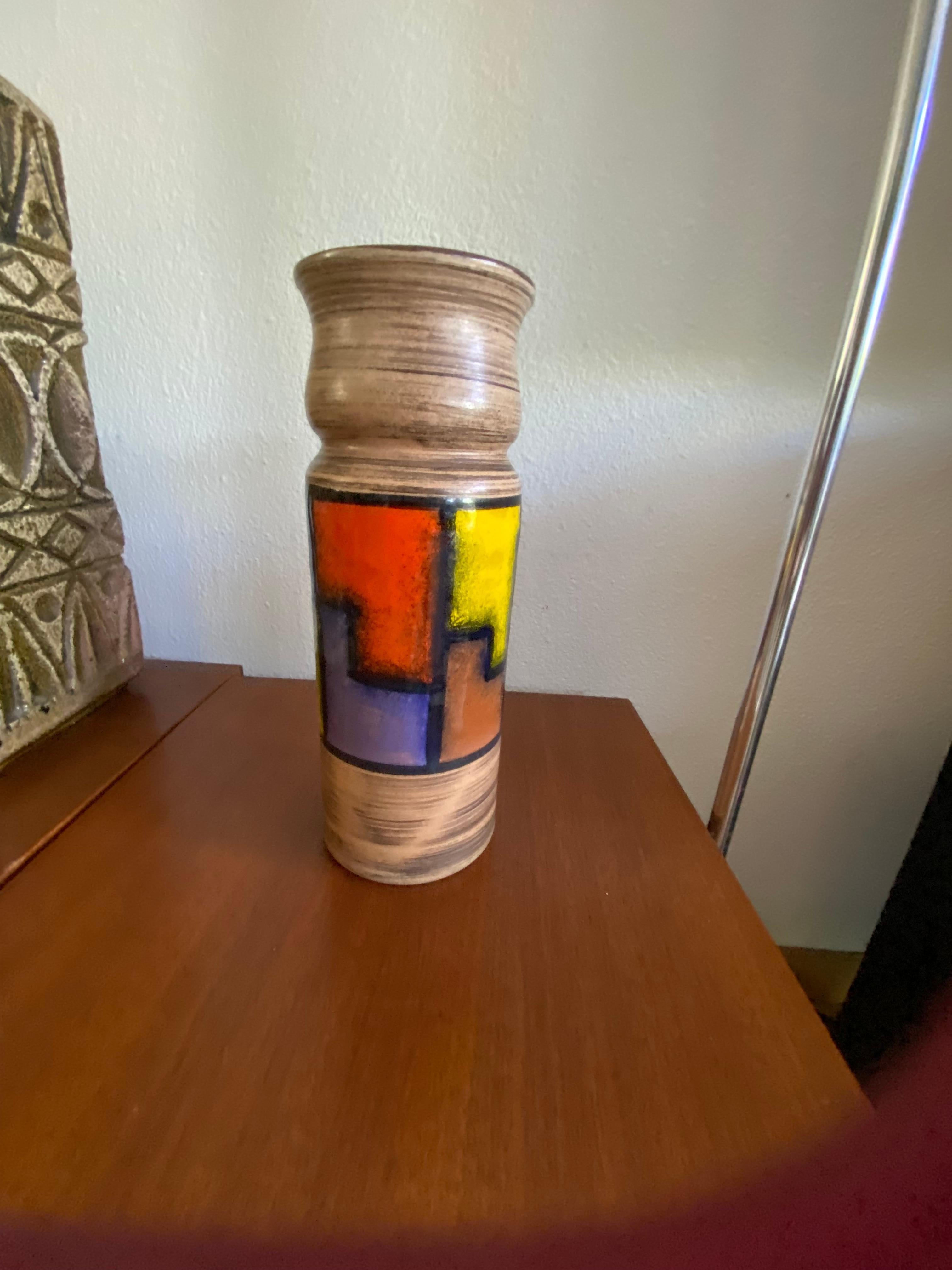 Midcentury pattern Vetrata vase by Aldo Londi for Bitossi Italy. Black, blue, orange, brown, grey and yellow on a brushed background.