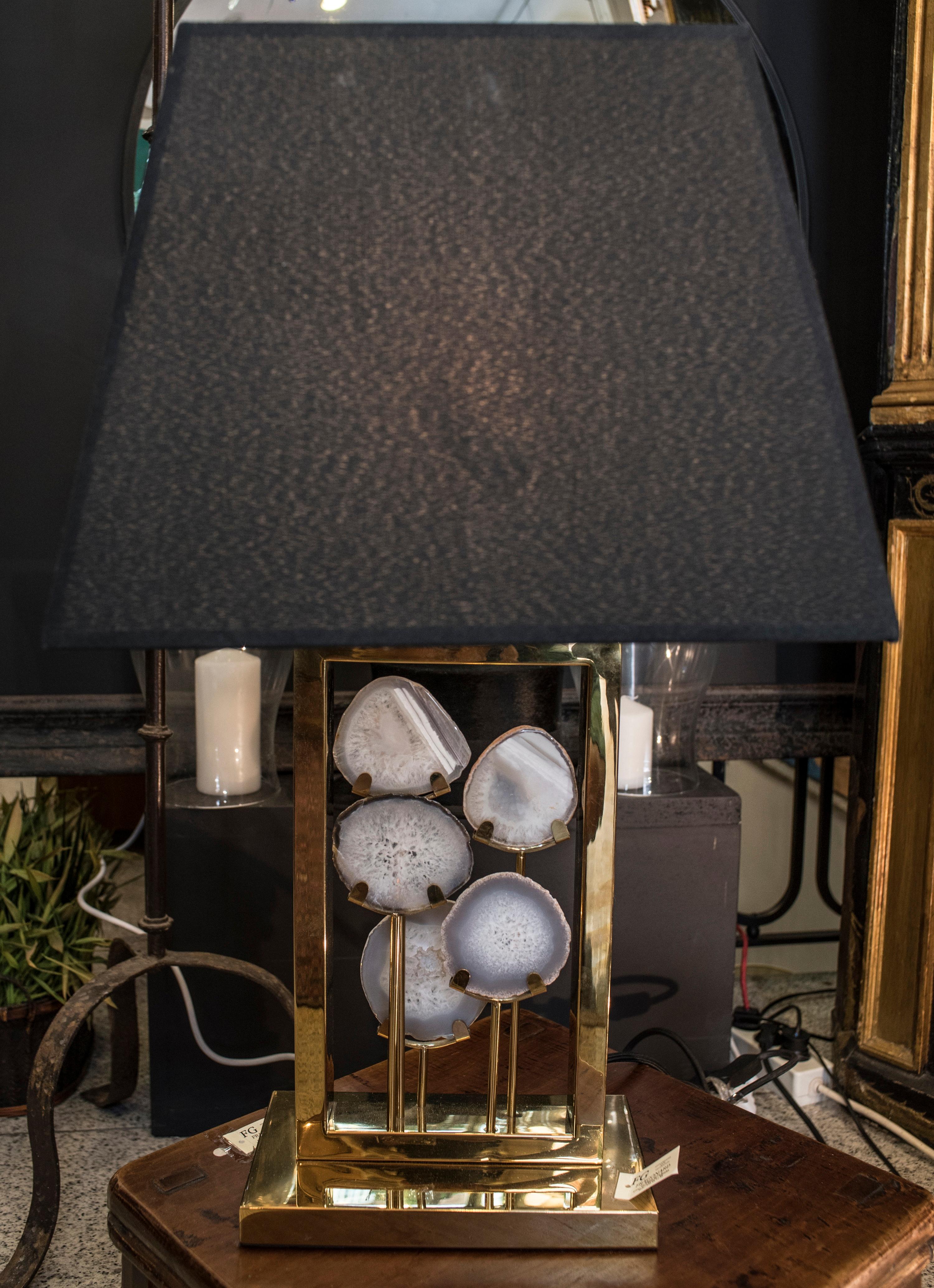 Stunning Willy Daro bronze and agatha slices table lamp, with a black lampshade.
A very beautiful table lamp as chic as a cosy!!!
In a very good condition with age and use. It has been purchased in Bruxells, in a private collection.