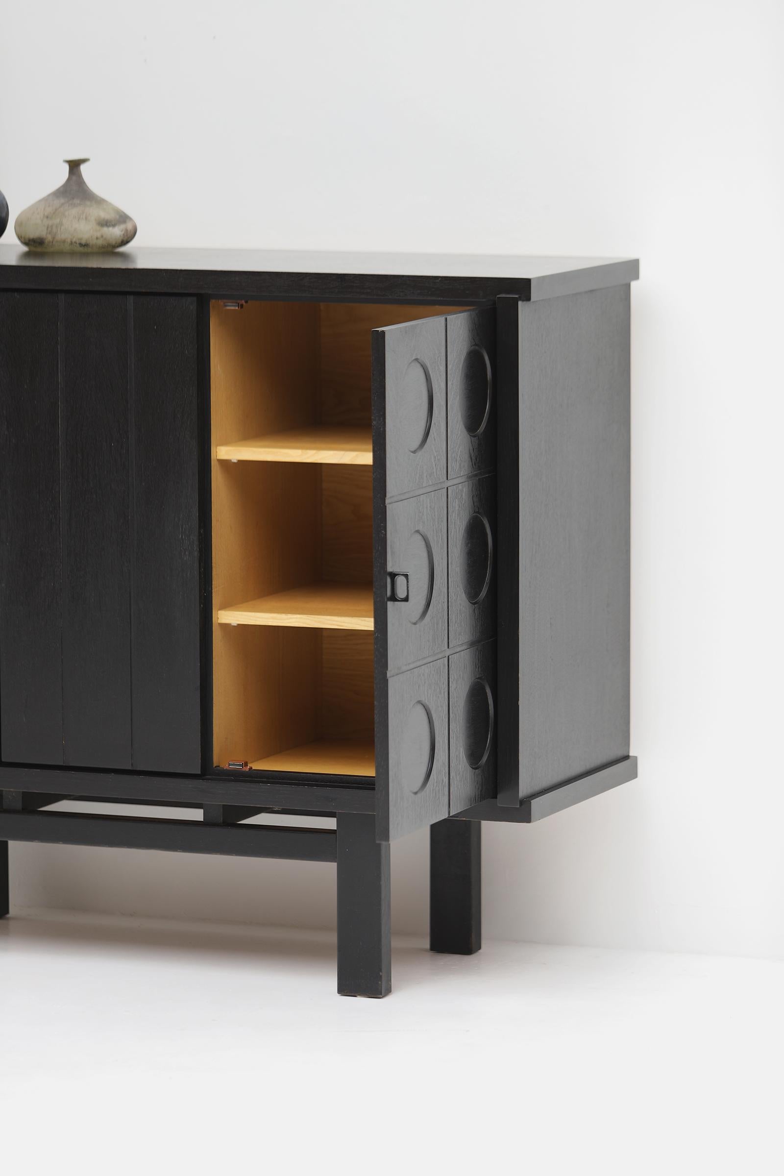 Lacquered Midcentury black brutalist Oak cabinet with graphical doors 1970s For Sale