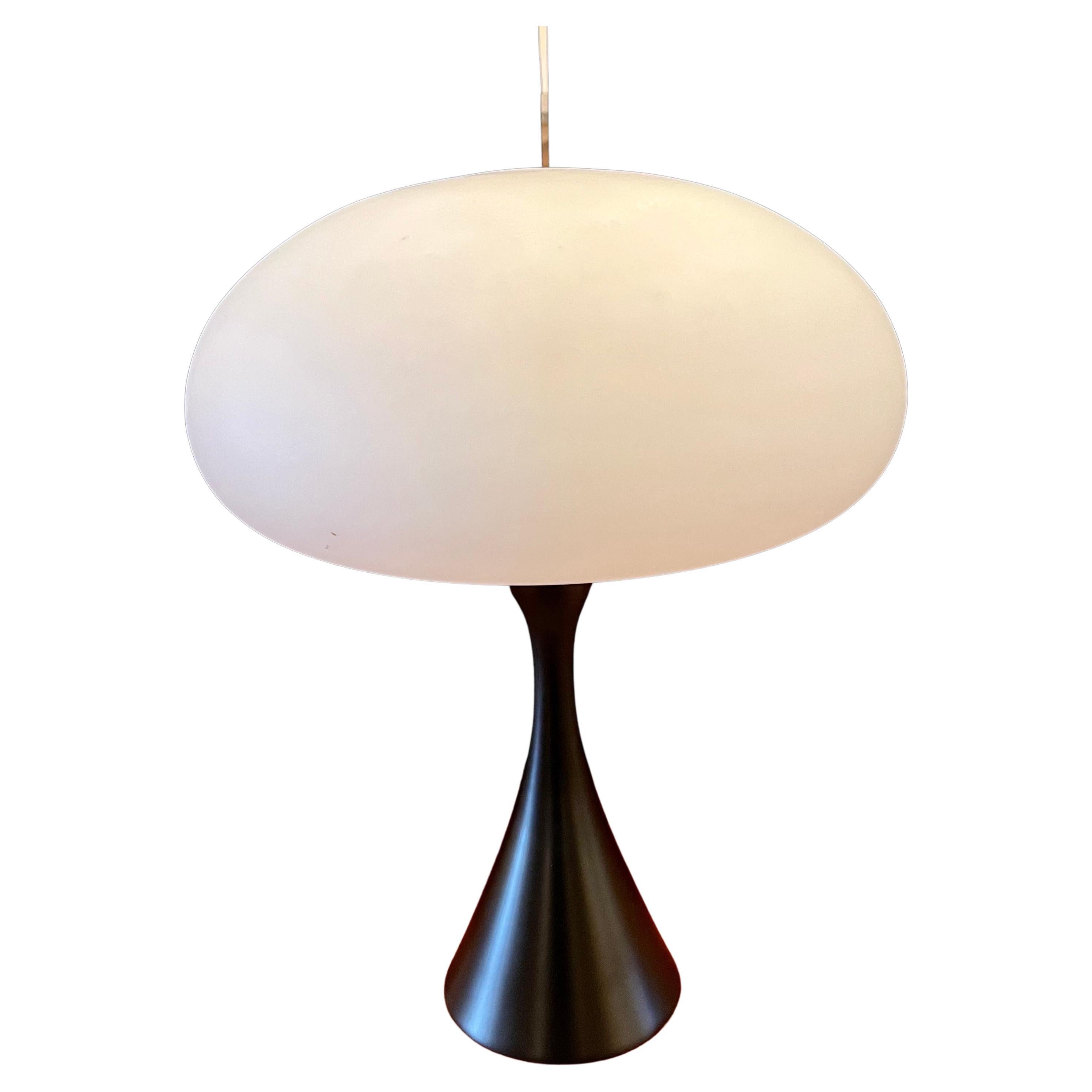 beautiful striking mushroom table lamp was designed by Laurel Lighting Company, the base has a black satin enamel finish, and the lampshade it’s made in Italy, mouth-blown glass.