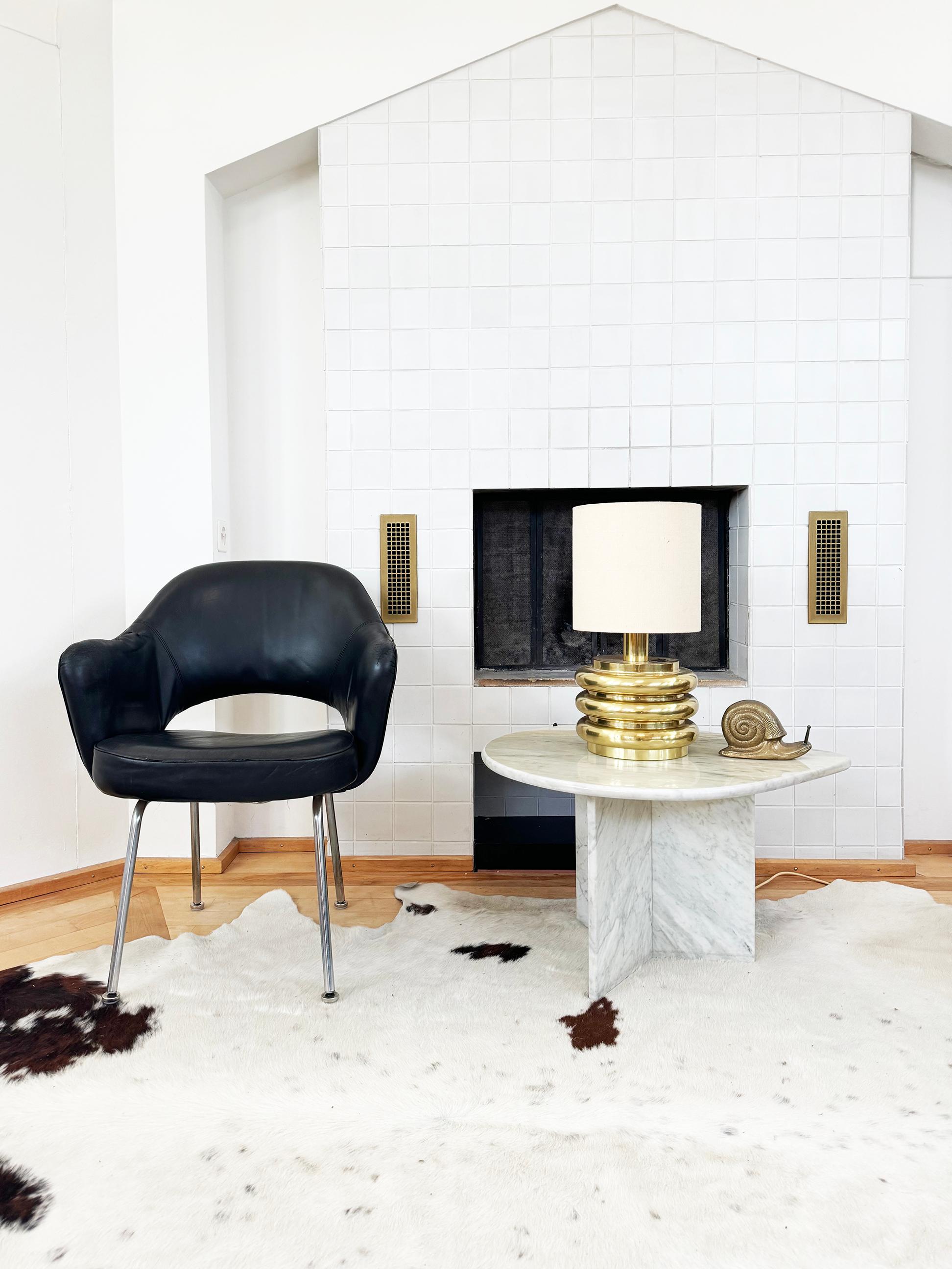 A Saarinen Executive Armchair in Black leather with a metal base.  This chair is completely original from the 1960's, and beautifully patinated.  The leather is conditioned and rock star vibe. Like a beautifully worn leather jacket.  The foam is