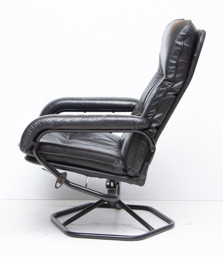 Midcentury Black Leather Reclining Armchair And Ottoman