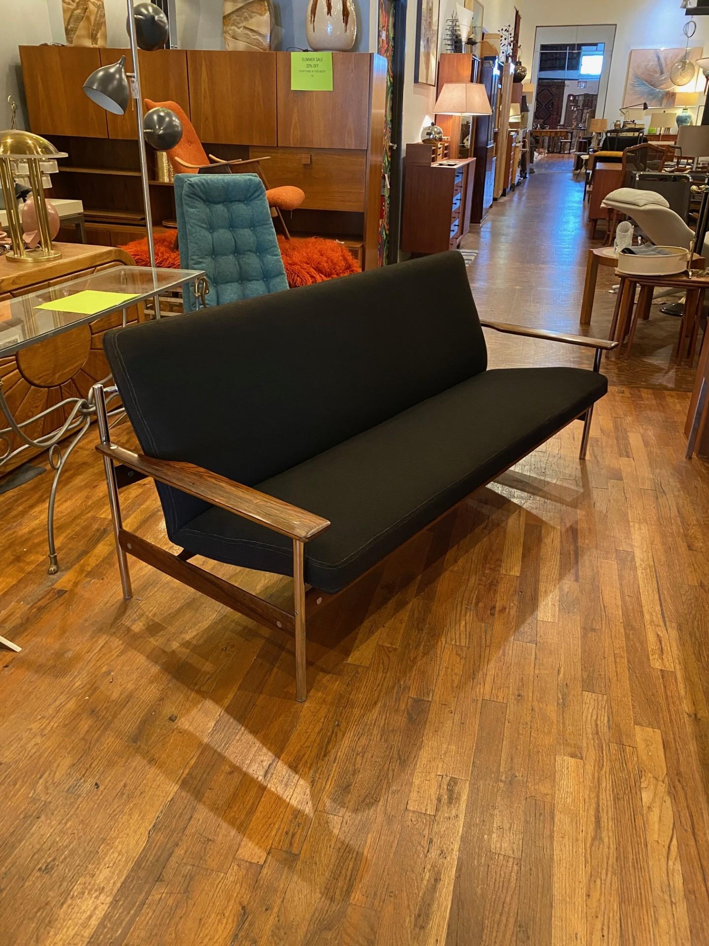 Beautiful unique Mid-Century Modern black wool upholstery 3-seat sofa wood and original fabric Model 1001 for Dokka 1959 by Norwegian Designer Sven Ivar Dysthe. Very soft original black wool fabric with stainless steel and hardwood frame and simple