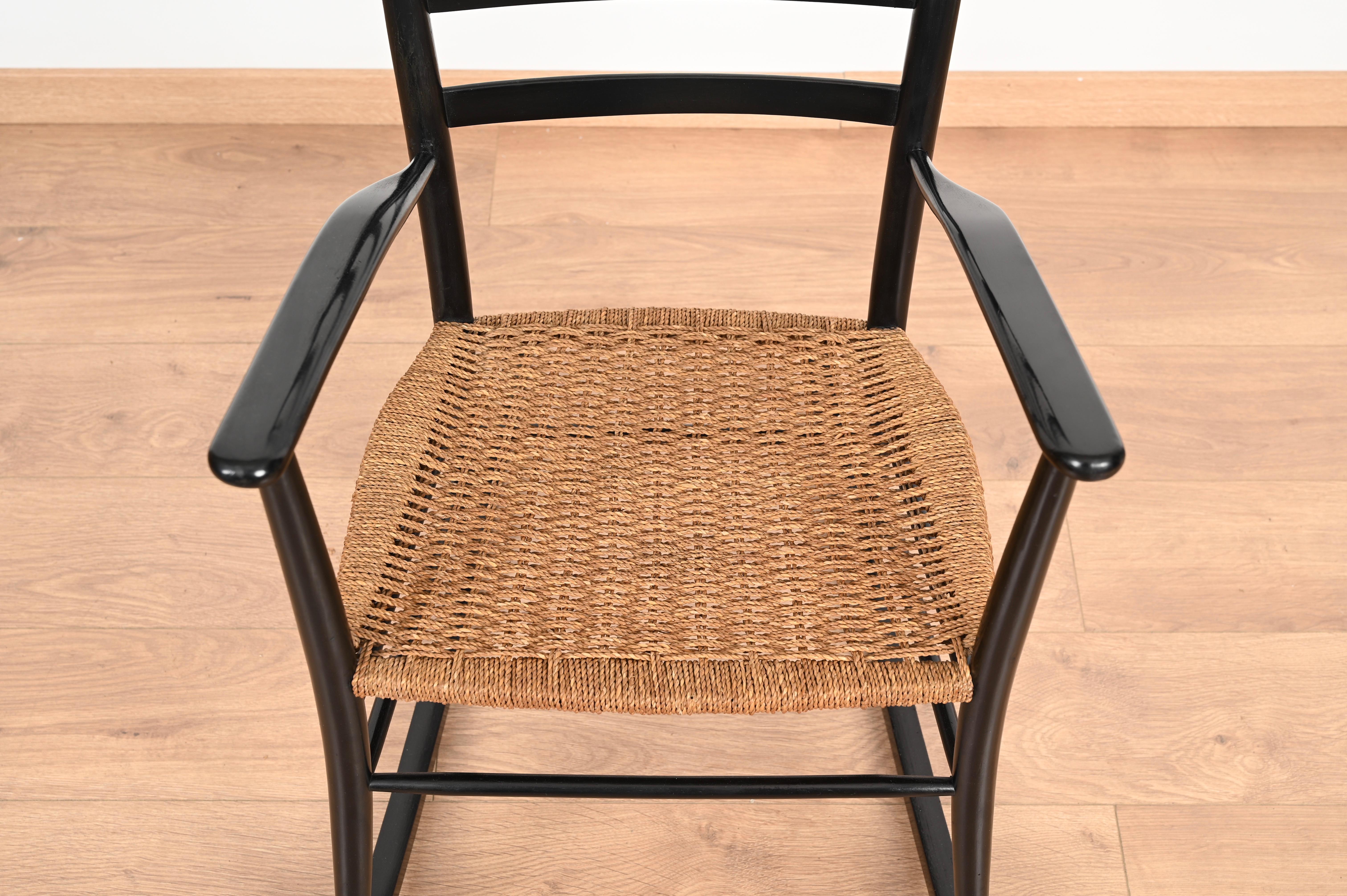 Lacquered Midcentury Black Wood Chiavari Rocking Chair with Rope Seat, Italy 1950s For Sale