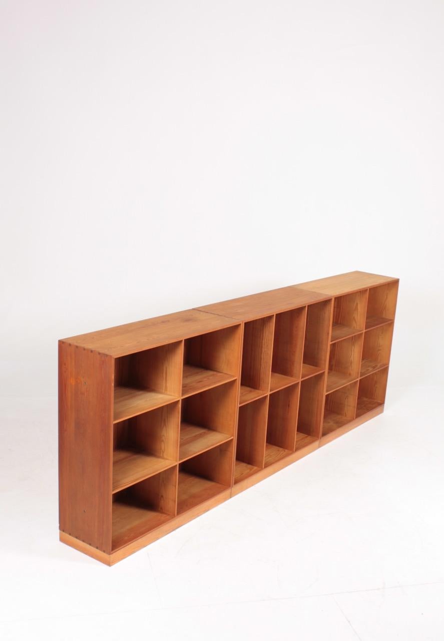 3 matching bookcases in solid pine designed by Mogens Koch for Rud. Rasmussen cabinetmakers in 1933. On the floor or to be hung on the wall. Made in Denmark and in all original condition.