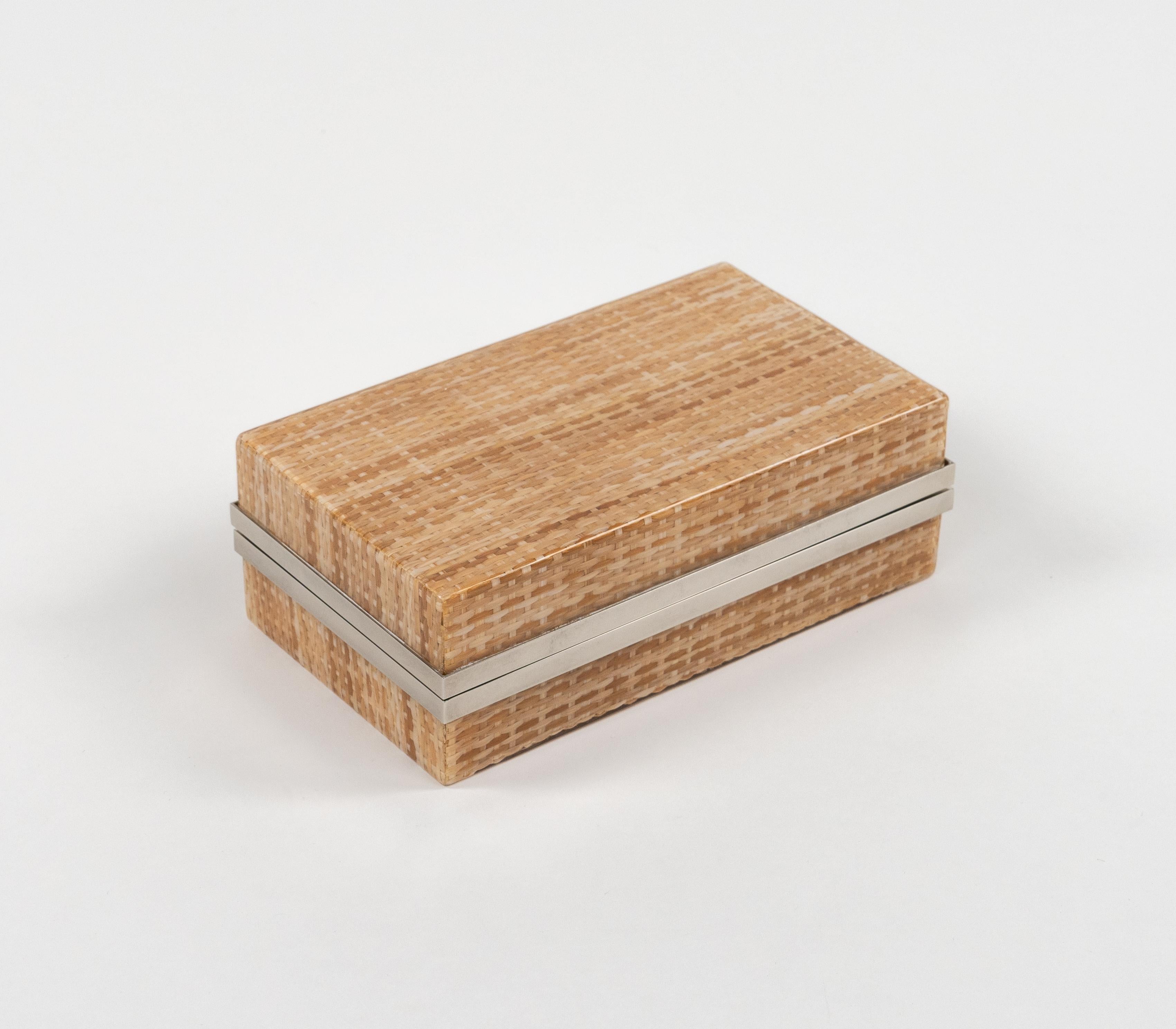 Midcentury amazing rectangular box in lucite, rattan and chrome in the style Christian Dior Home.   

Made in Italy in the 1970s.   

Great accessory for any modern interior.