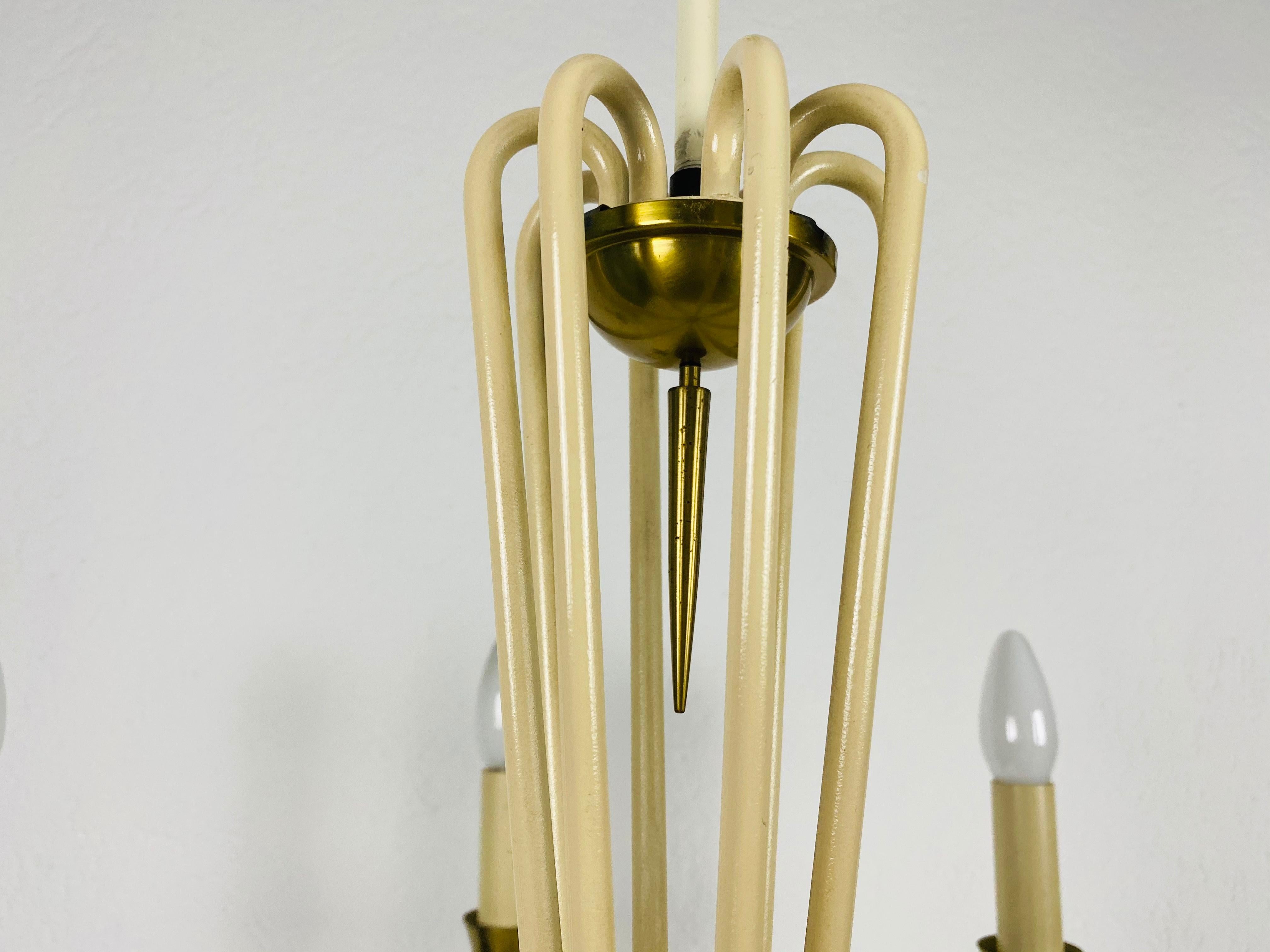 Mid-20th Century Midcentury Brass 8-Arm Sputnik Chandelier by Vereinigte Werkstätte, 1960s For Sale