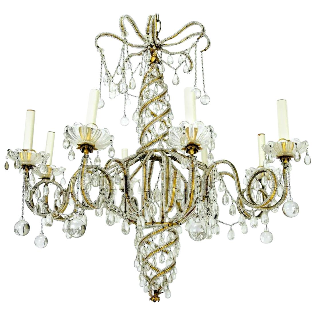 Midcentury Brass and Beaded Crystal 8-Light Chandelier Attributed to Baguès For Sale