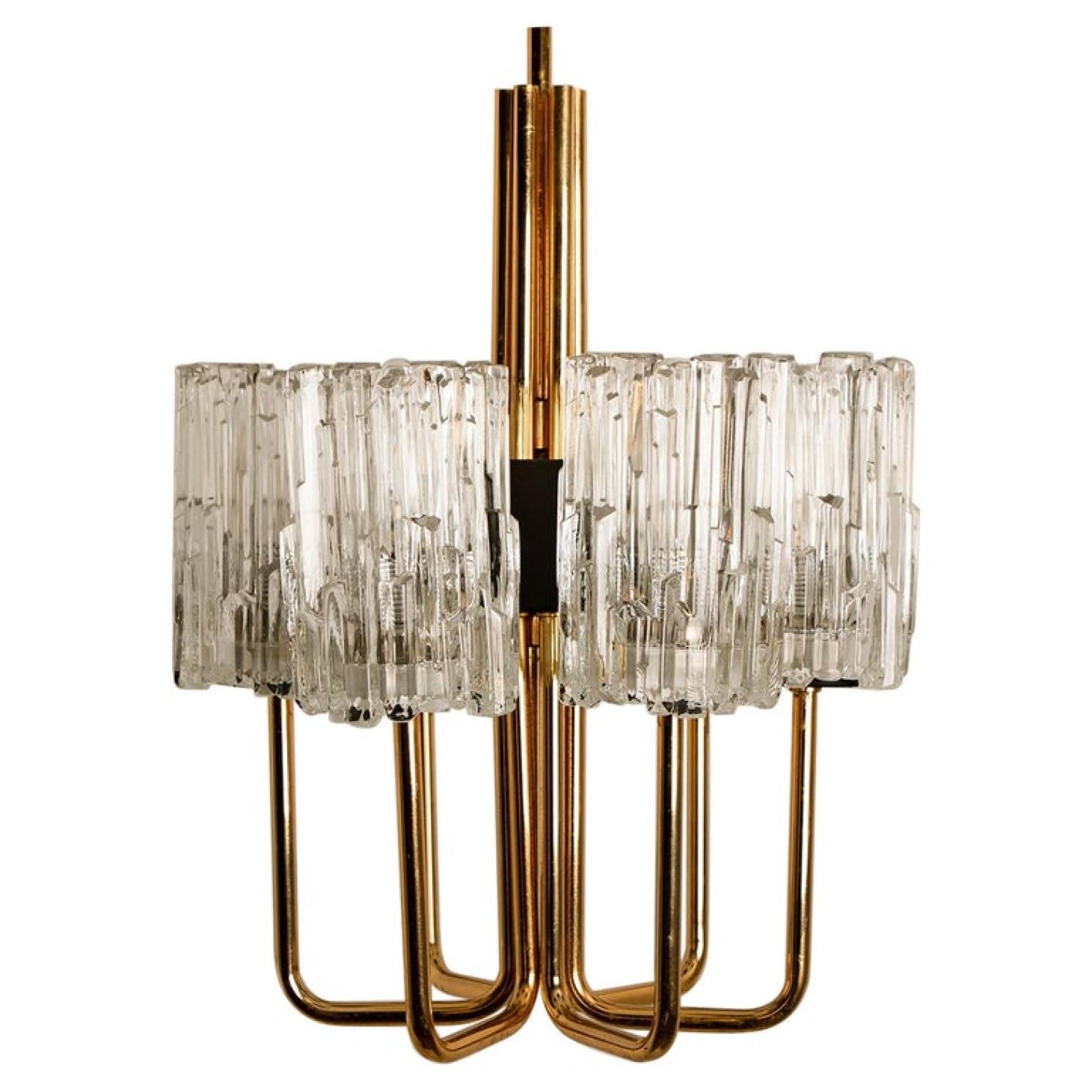 Beautiful chandelier by Hillebrand. With textured glass shades brass details a brass mounting hardware and black cord.
Illuminates beautifully.

The chandelier is cleaned well-wired and ready to use. The chandelier requires 6 x E27 light bulbs.