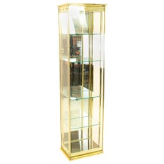 gold and glass display cabinet Mid Century Brass and Glass Display Cabinet