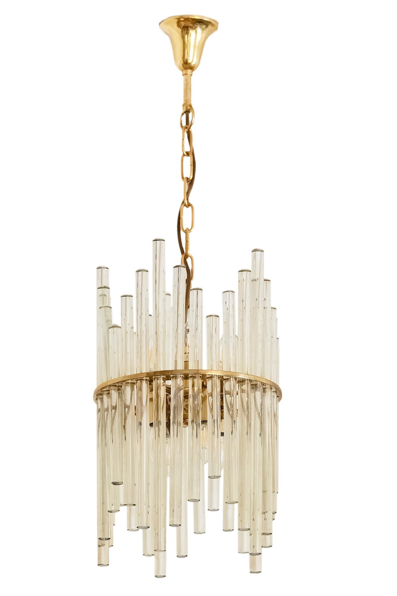 Midcentury gilded brass and clear crystal glass chandelier by Ernst Palme from 1960s, Germany.
Chandelier includes 8 pieces of E14 bulbs.


 