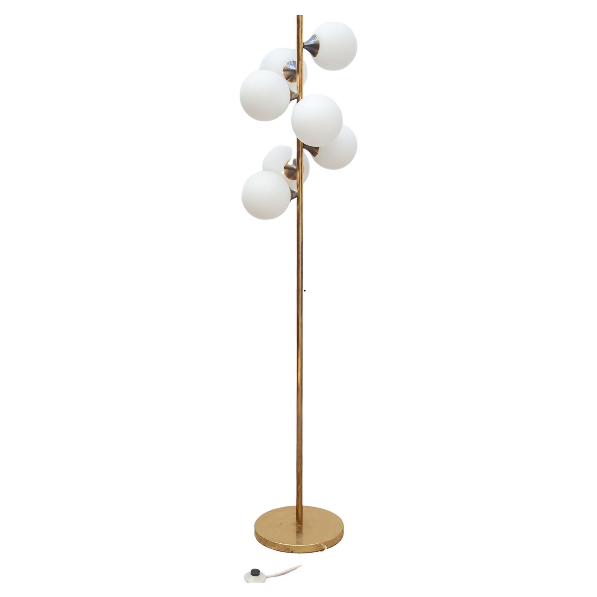 Kaiser floor Lamp 7 lights opaline glass globes and brass base, 1950, Germany. Beautiful mid century floor lamp. Very elegant and sleek design. Qualitative lamp made in the 1950s. In good vintage condition.Height: 165cm/7 lamps fitting e14.