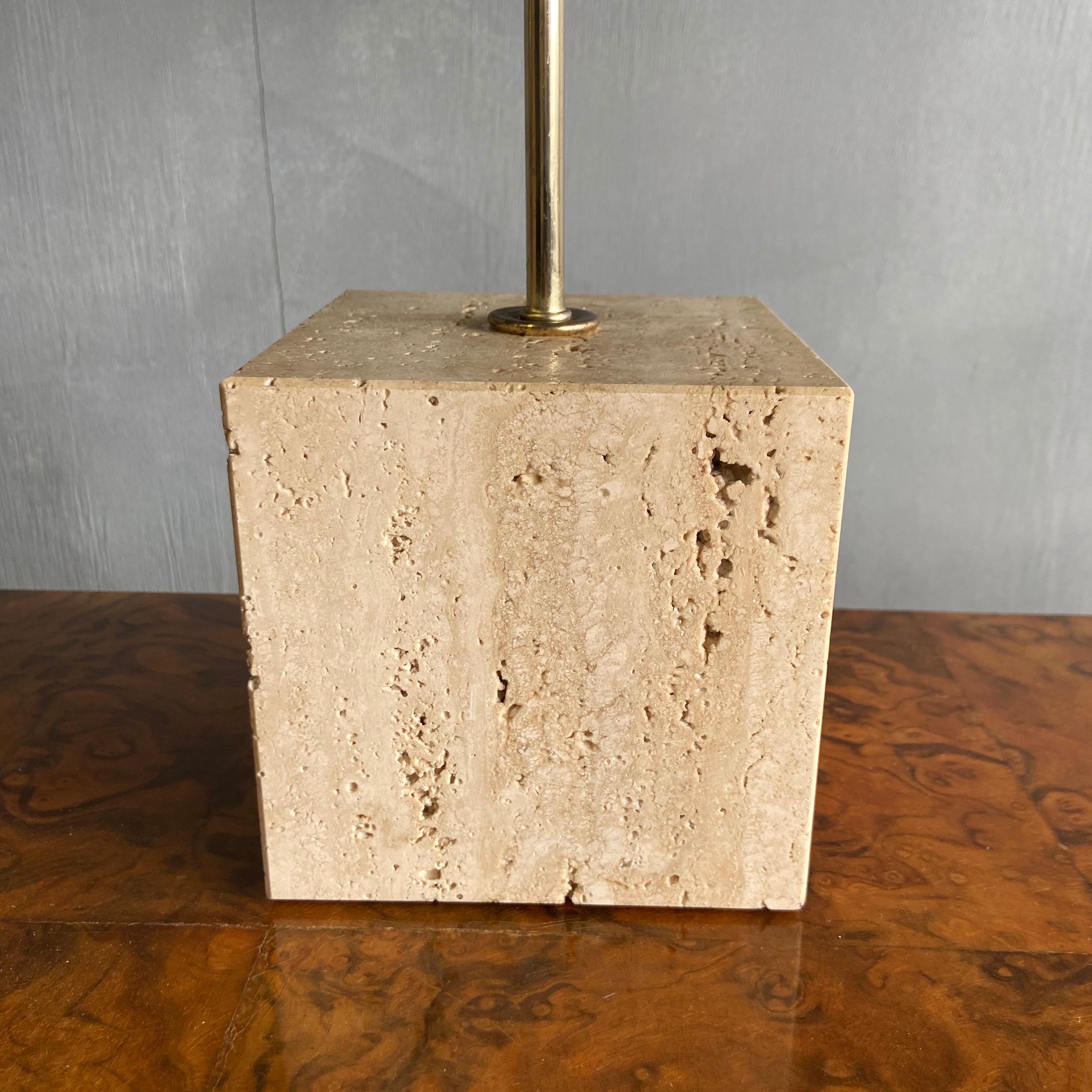For your consideration is this wonderful midcentury Harvey Guzzini polished brass arched table or desk lamp mounted on a square travertine stone base. Showing natural warm patina free of dings to the shade or kinks to the arm. In excellent vintage