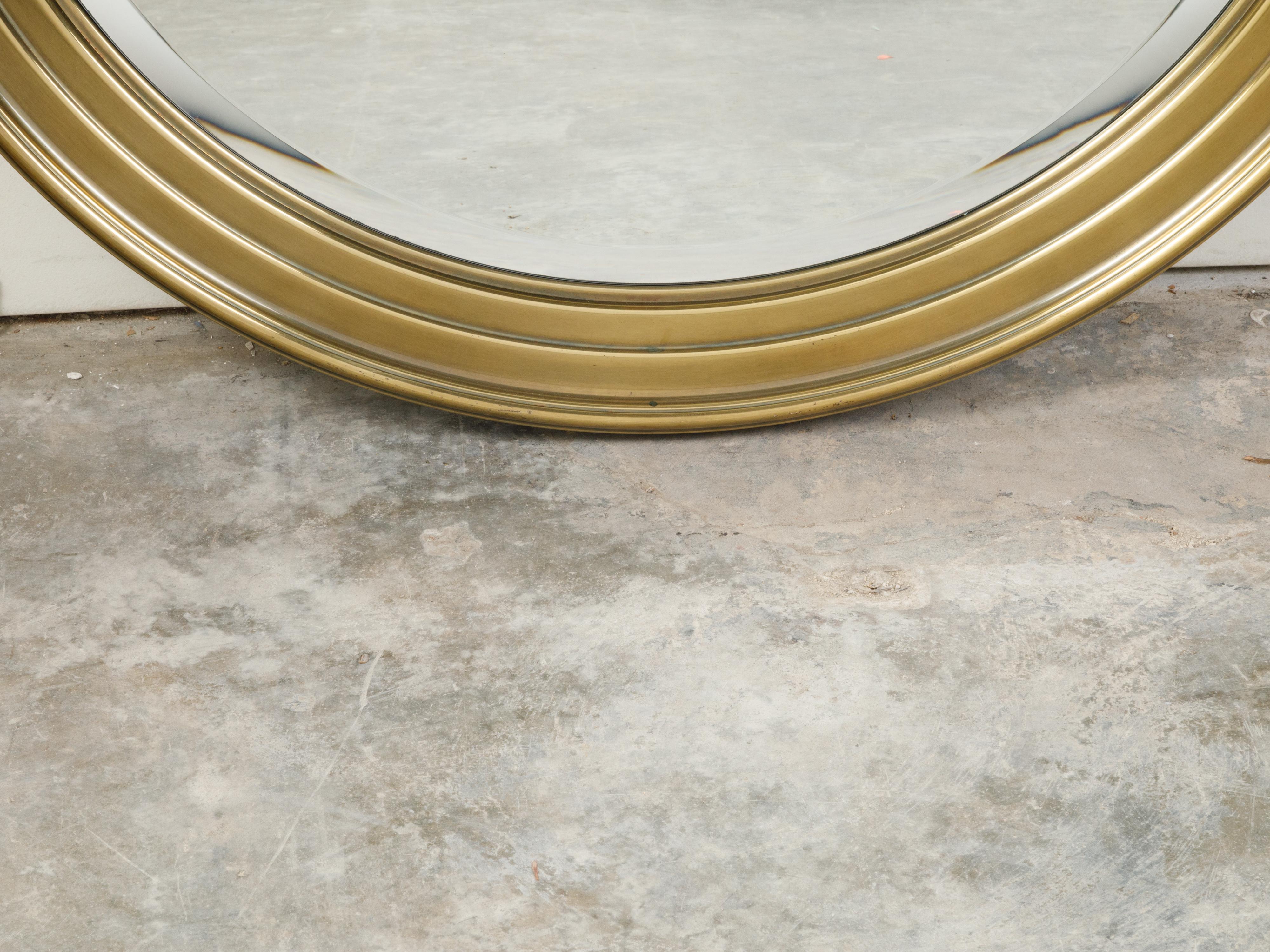 20th Century Midcentury Brass Circular Mirror with Stepped Frame and Beveled Edge For Sale
